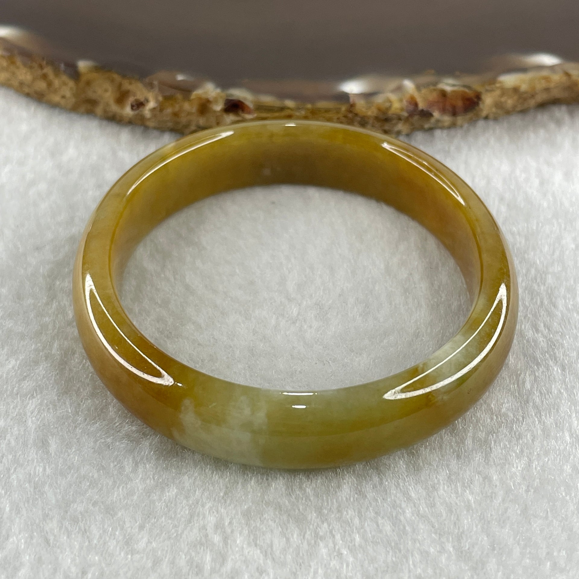 Type A Natural Intense Brownish Yellow Jadeite Oval Bangle 30.33g Inner Diameter 52.7mm 11.0 by 6.5mm (Very Slight Internal Lines) - Huangs Jadeite and Jewelry Pte Ltd