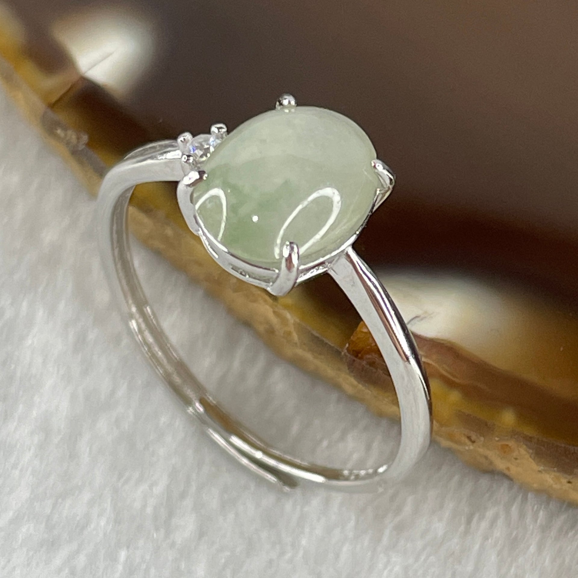 Natural Type A Semi Icy Faint Green Jadeite Oval Shape Cabouchon in S925 Silver Ring (Adjustable Size) 1.18g 8.8 by 6.4 by 3.0mm - Huangs Jadeite and Jewelry Pte Ltd