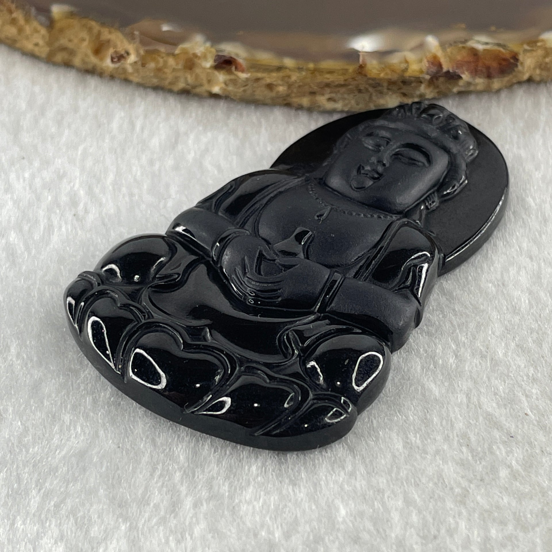 Type A Opaque Black Omphacite Jadeite Guan Yin Pendant 28.39g 63.4 by 38.8 by 7.5mm - Huangs Jadeite and Jewelry Pte Ltd