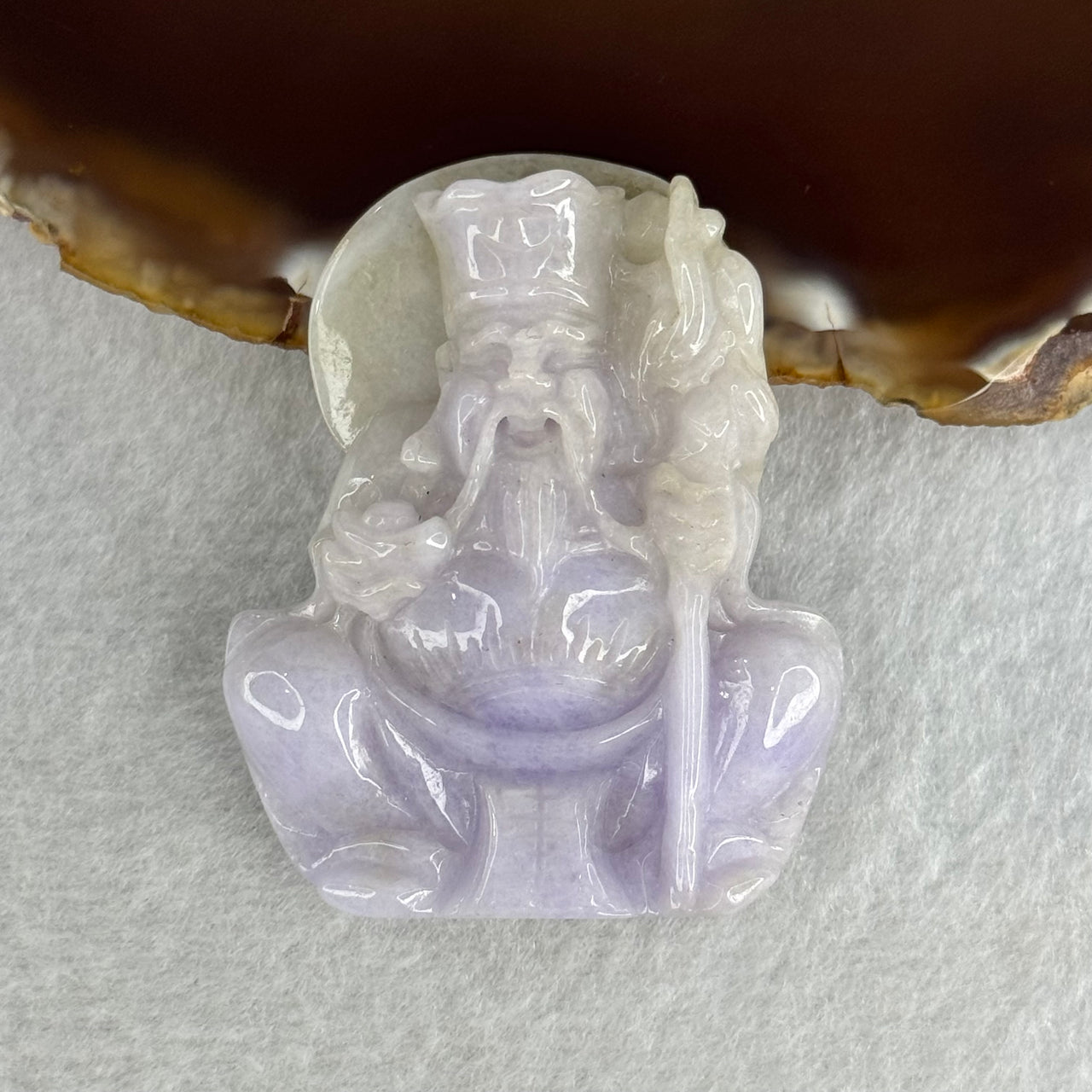 Type A Lavender with Slight Green Jadeite Tu Di Gong 38.27g 48.0 by 39.3 by 11.9mm - Huangs Jadeite and Jewelry Pte Ltd