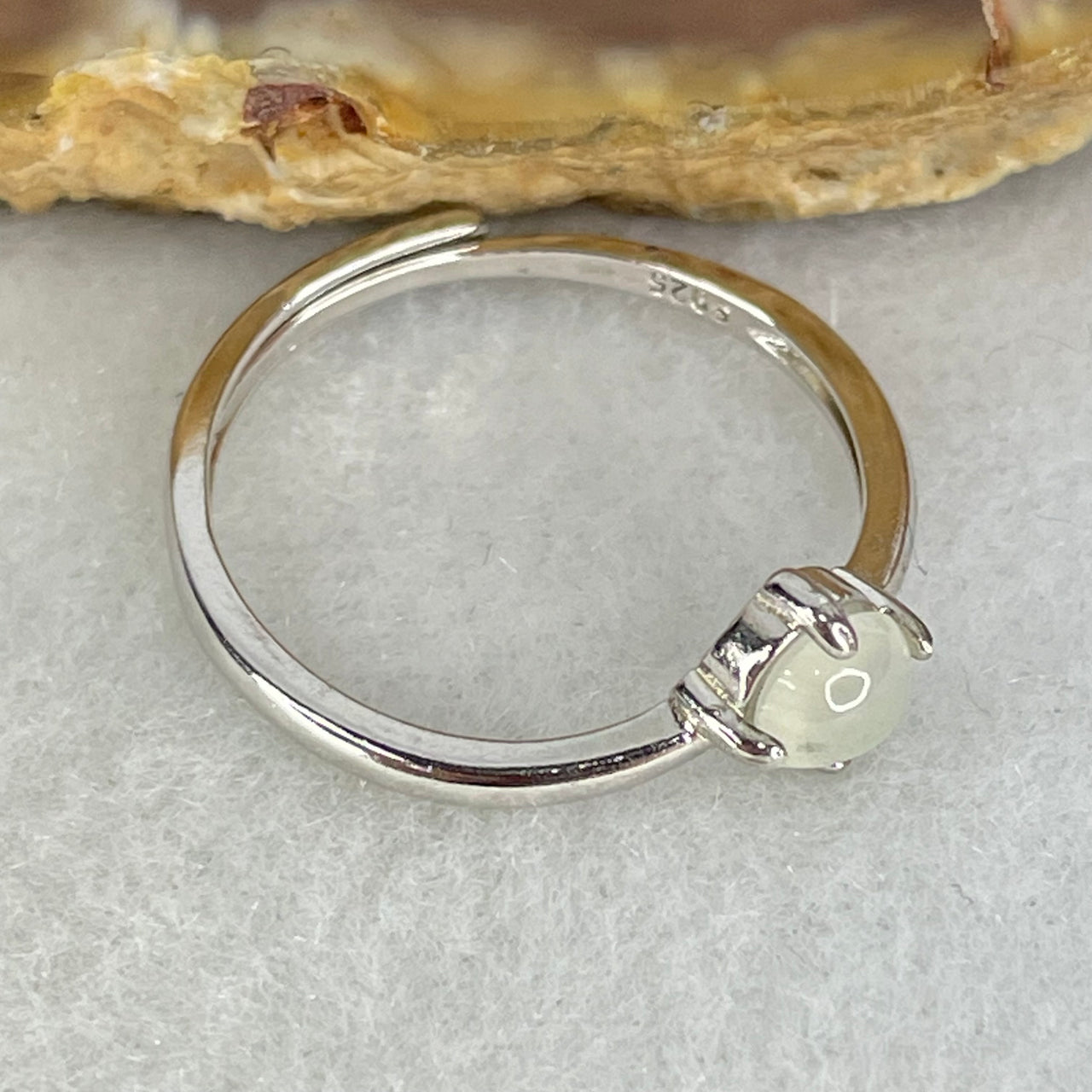 Type A Icy Faint Green Cabochon Jadeite in S925 Sliver Ring (Adjustable Size) 1.05g 4.5 by 3.0mm - Huangs Jadeite and Jewelry Pte Ltd