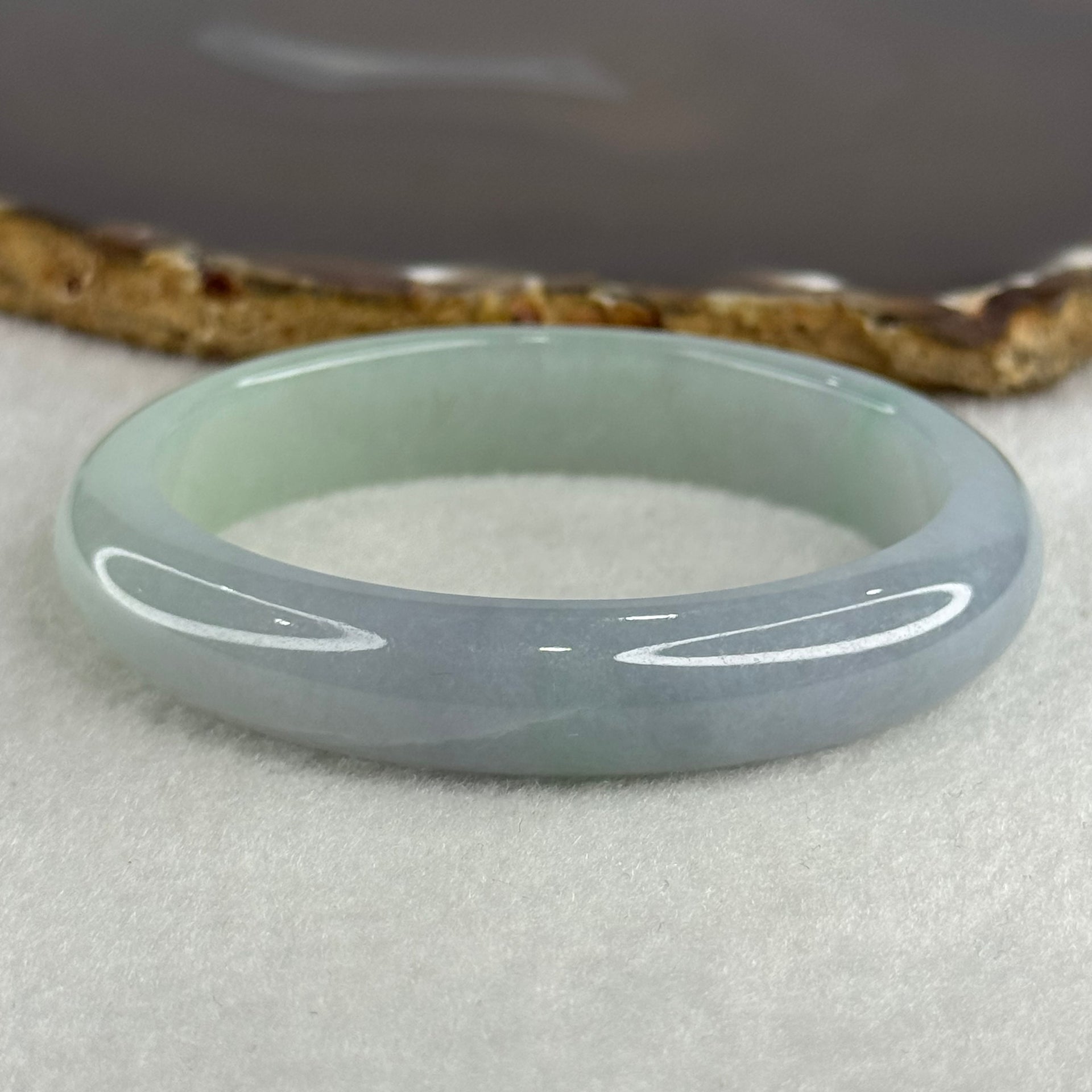 Type A Jelly Faint Green Faint Lavender Jadeite Oval Bangle 48.77g Inner Diameter 57.7mm 12.1 by 8.0mm with NGI Cert No. 32888362 (Internal Line) - Huangs Jadeite and Jewelry Pte Ltd