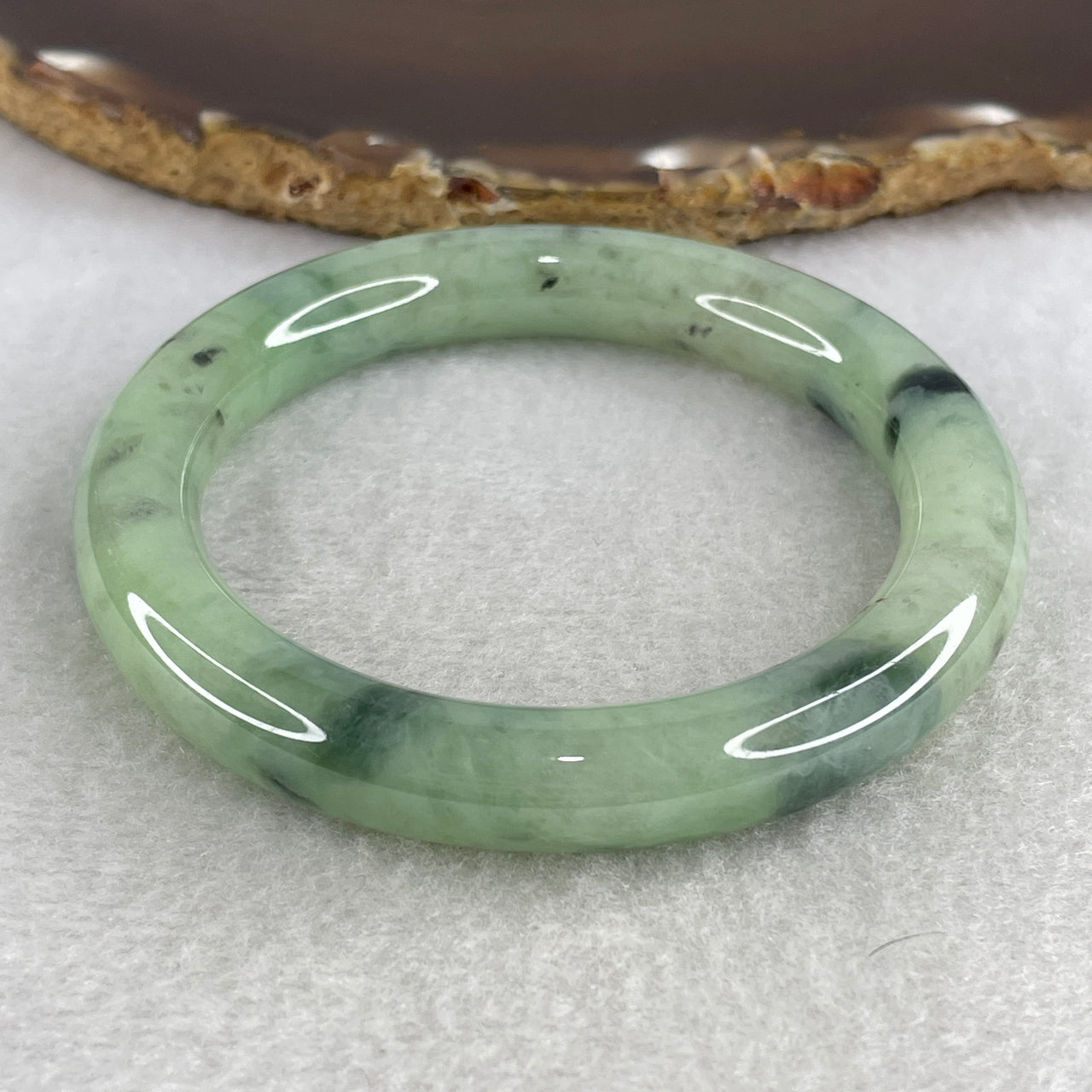 Natural Type A Multicolor Jadeite Bangle | 53.9mm Light Vibrant Green with Deep Dark Green Floating Flora "Piao Hua" | Substantive Round "Fei Cui" Wrist Heirloom (49.34g 9.8x9.6mm) Very Slight Internal Lines