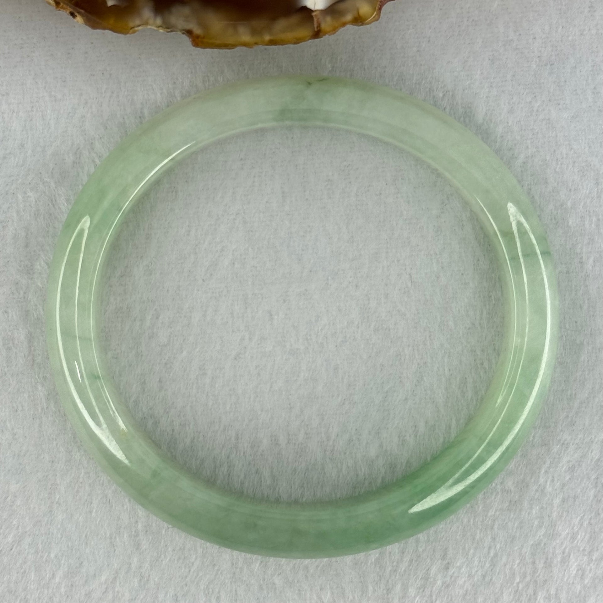 Type A Semi Icy Bright Green Jadeite Oval Bangle Internal Diameter 54.4mm 40.37g 11.3 by 8.4mm (Slight Internal Lines) - Huangs Jadeite and Jewelry Pte Ltd