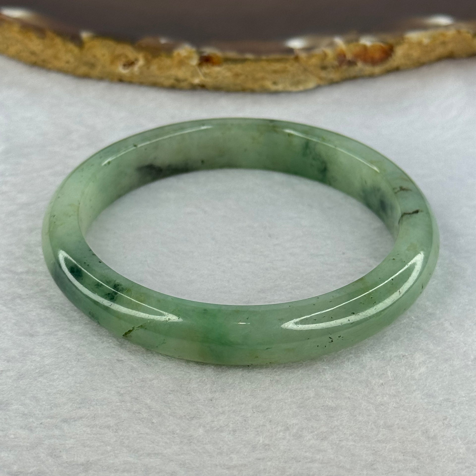 Type A Green Piao Hua Jadeite Bangle Internal Diameter 54.3mm 35.82g 9.9 by 7.5mm (Slight External Line) - Huangs Jadeite and Jewelry Pte Ltd
