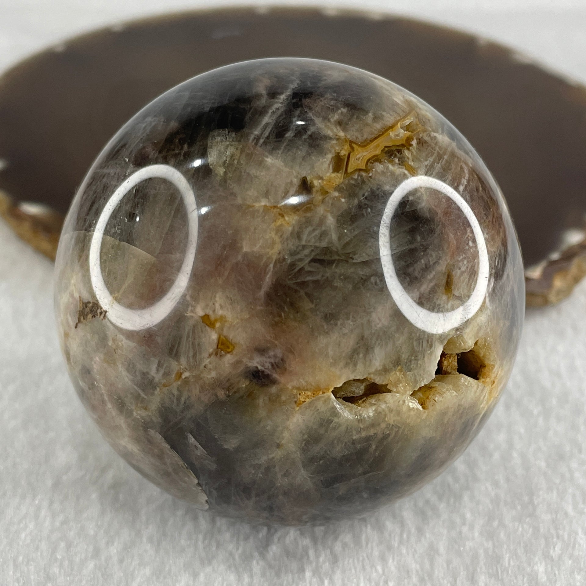 Natural Black Moonstone Ball with Clear Acrylic Display 443.95g 69.0 by 90.0mm - Huangs Jadeite and Jewelry Pte Ltd