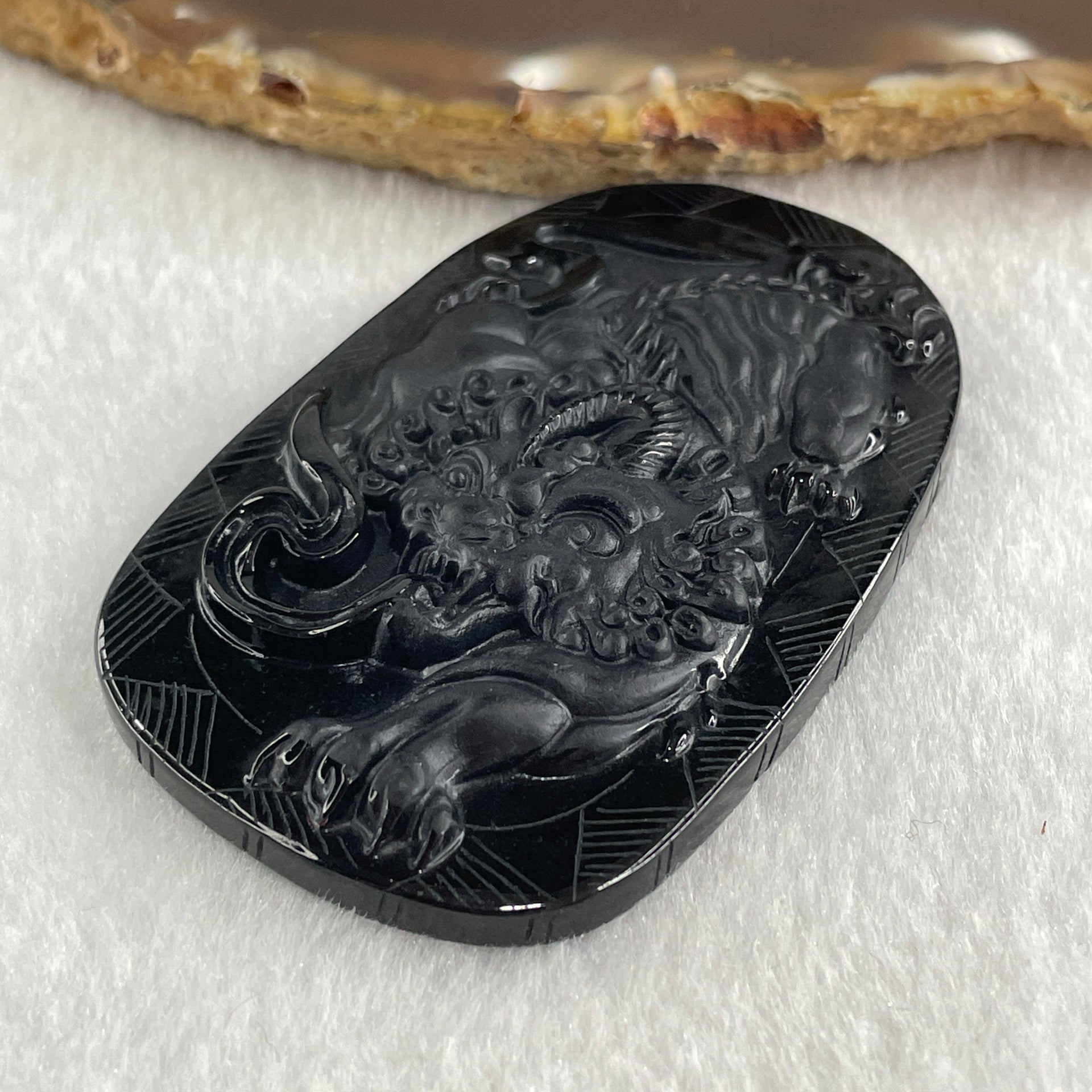 Type A Opaque to Partial Translucent Black Omphacite Jadeite Pixiu Pendant 23.77g 63.4 by 40.9 by 8.3mm - Huangs Jadeite and Jewelry Pte Ltd