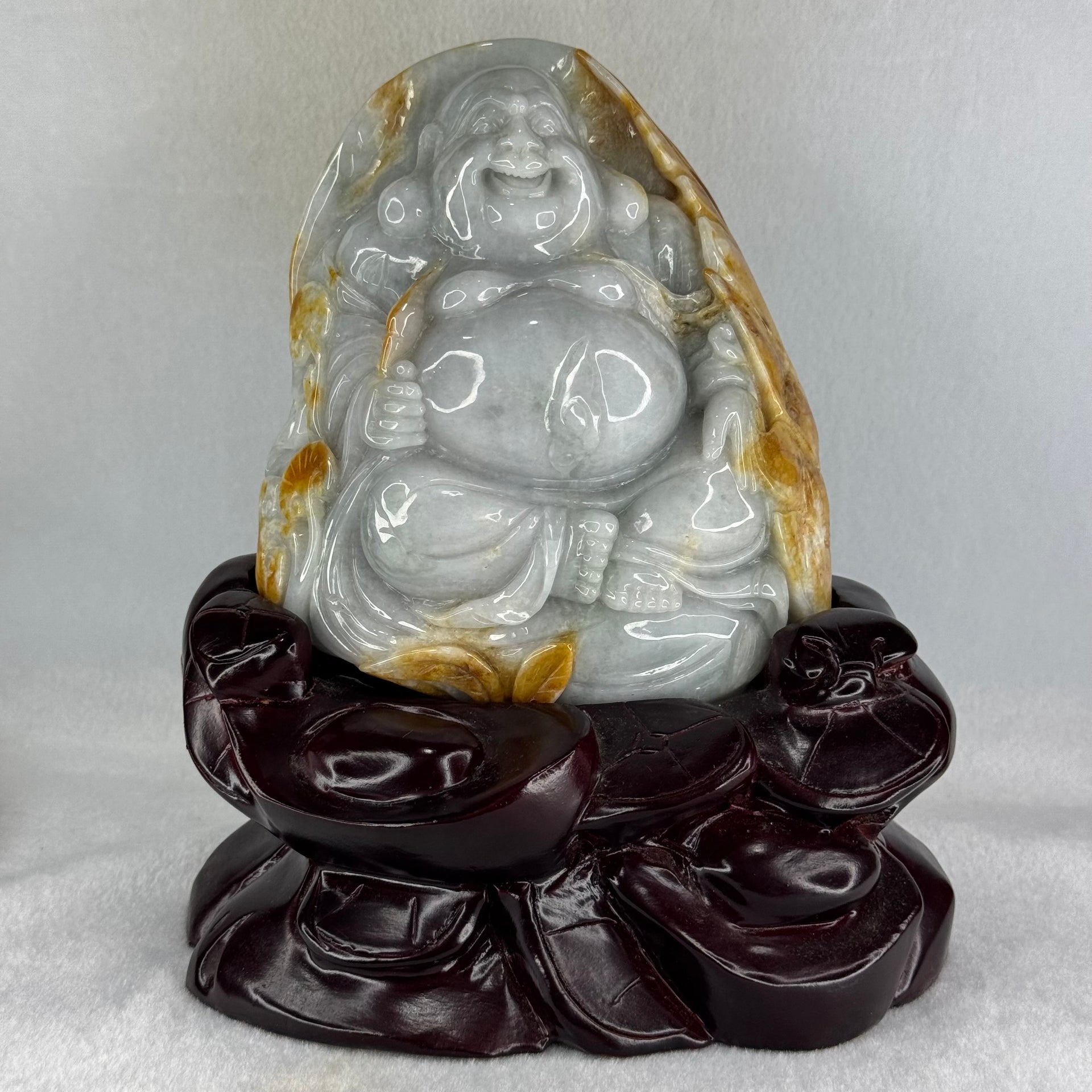 Type A Light Green with Faint Lavender and Yellow Jadeite Milo Buddha Display 170.0 by 100.0 by 190.0mm with wooden stand 2,574.1g - Huangs Jadeite and Jewelry Pte Ltd