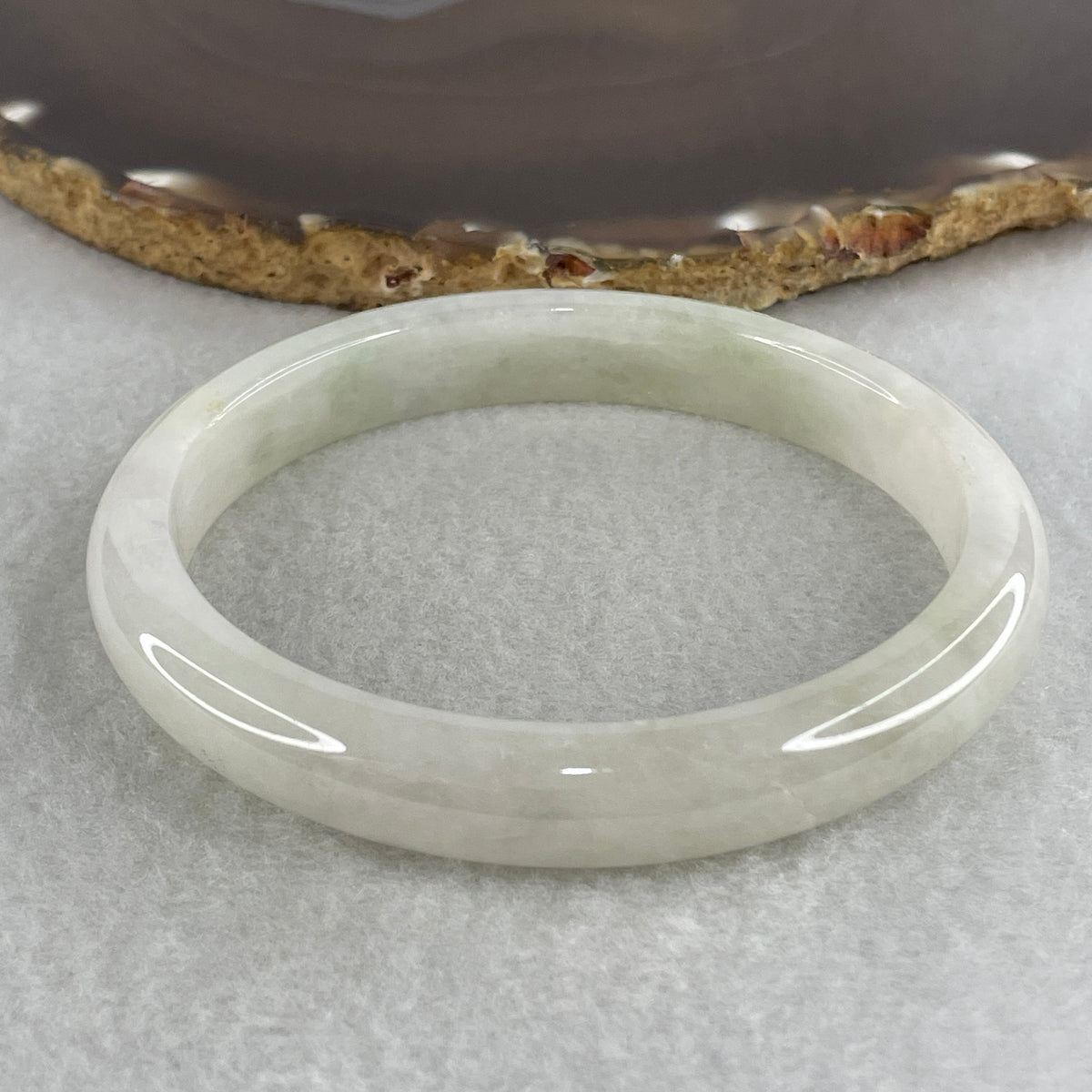 Certified Natural Type A Near White & Faint Green Jadeite Oval Bangle | 65.1mm Inner Diameter (48.42g 10.8x7.7mm | Internal Line, Slight External Rough | Pure Peace & Heart Harmony) - Huangs Jadeite and Jewelry Pte Ltd