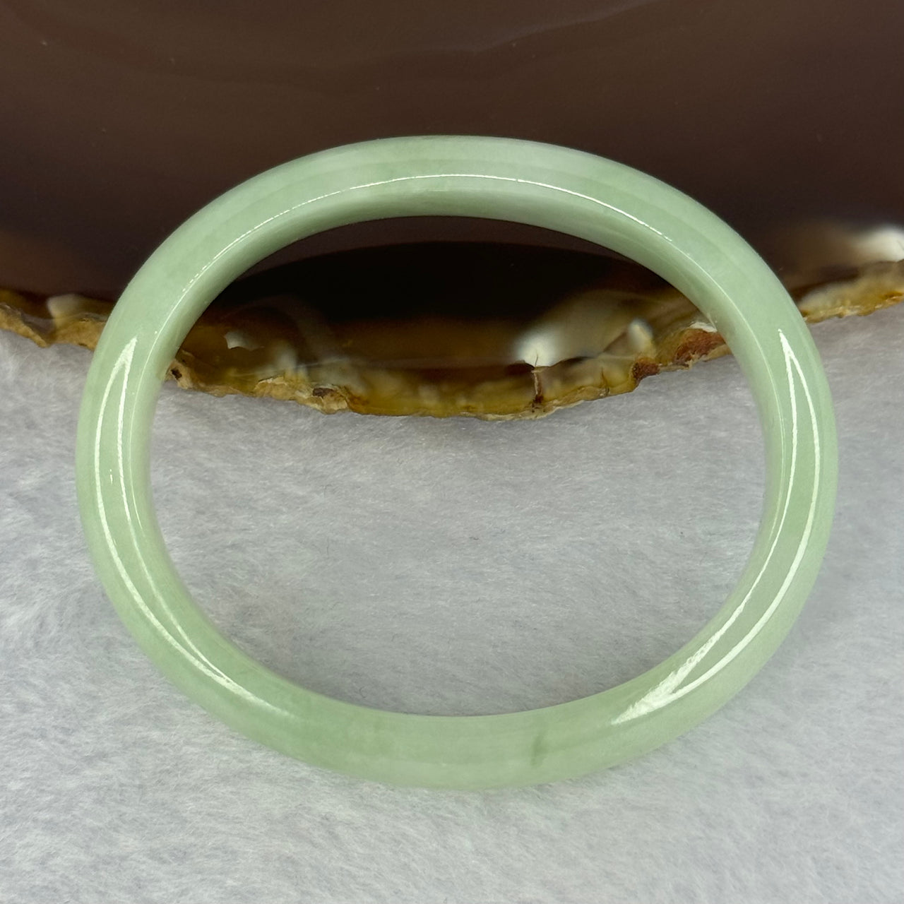 Type A Light Apple Green Jadeite Oval Bangle 33.35g Internal Diameter 52.3mm 12.2 by 6.5mm (Very Slight Fine Internal Lines) - Huangs Jadeite and Jewelry Pte Ltd