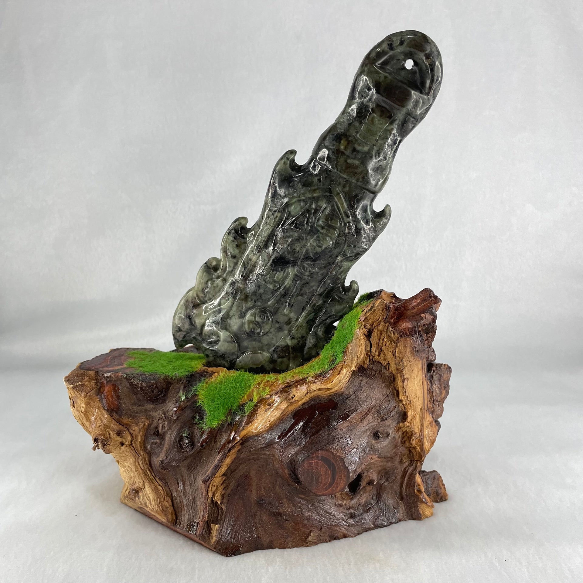 Type A Green with Dark Green to Black Piao Hu Flora Jadeite Axe with Yin and Yang 320.38g with Wooden Stand Display Total 904.5g 170.0 by 124.0 by 195.0mm - Huangs Jadeite and Jewelry Pte Ltd