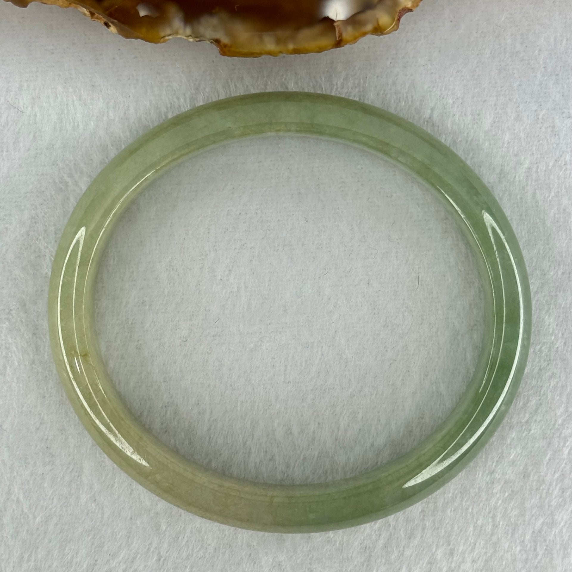 Type A Full Green Jadeite Oval Bangle Internal Diameter 55.4mm 11.9 by 6.5mm (Very Slight Fine Internal Lines) - Huangs Jadeite and Jewelry Pte Ltd