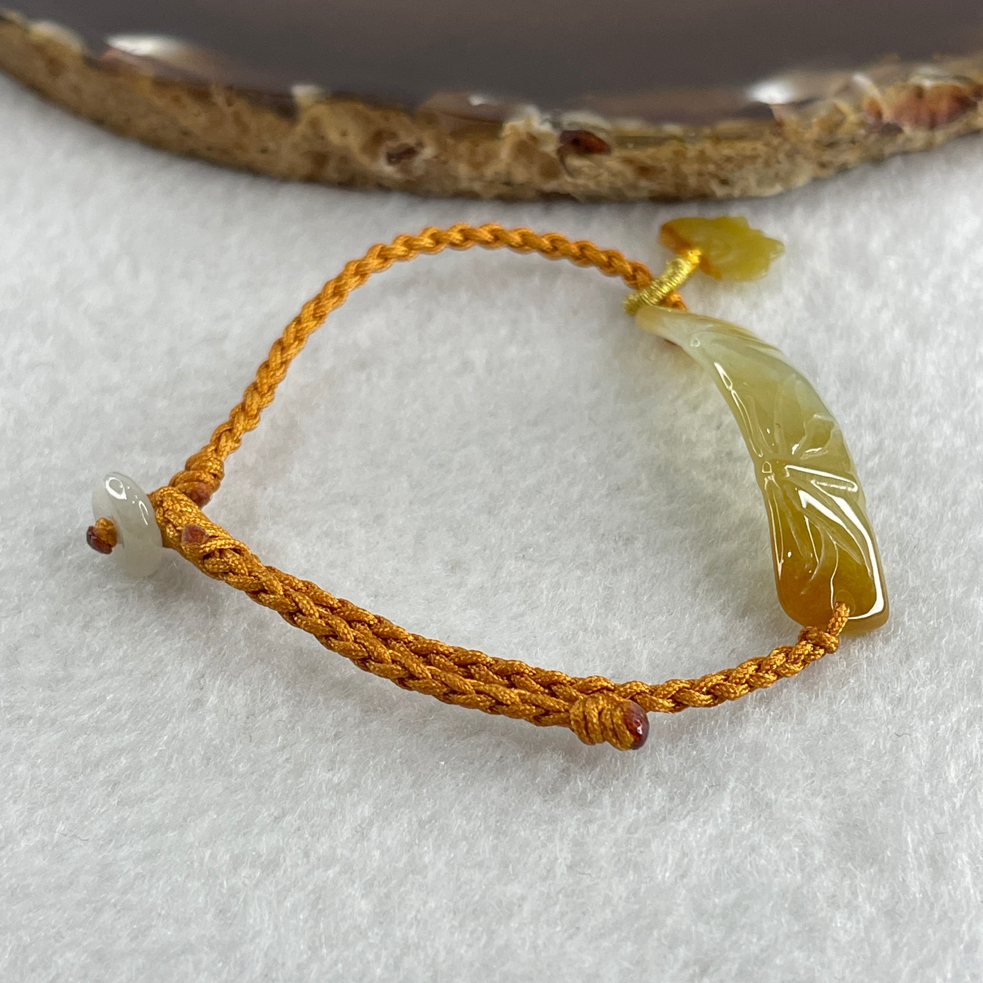 Natural Type A Yellowish with Light Green Jadeite Bamboo with Butterfly in String Bracelet 3.97g 14-16cm 39.1 by 9.1 by 2.9mm - Huangs Jadeite and Jewelry Pte Ltd