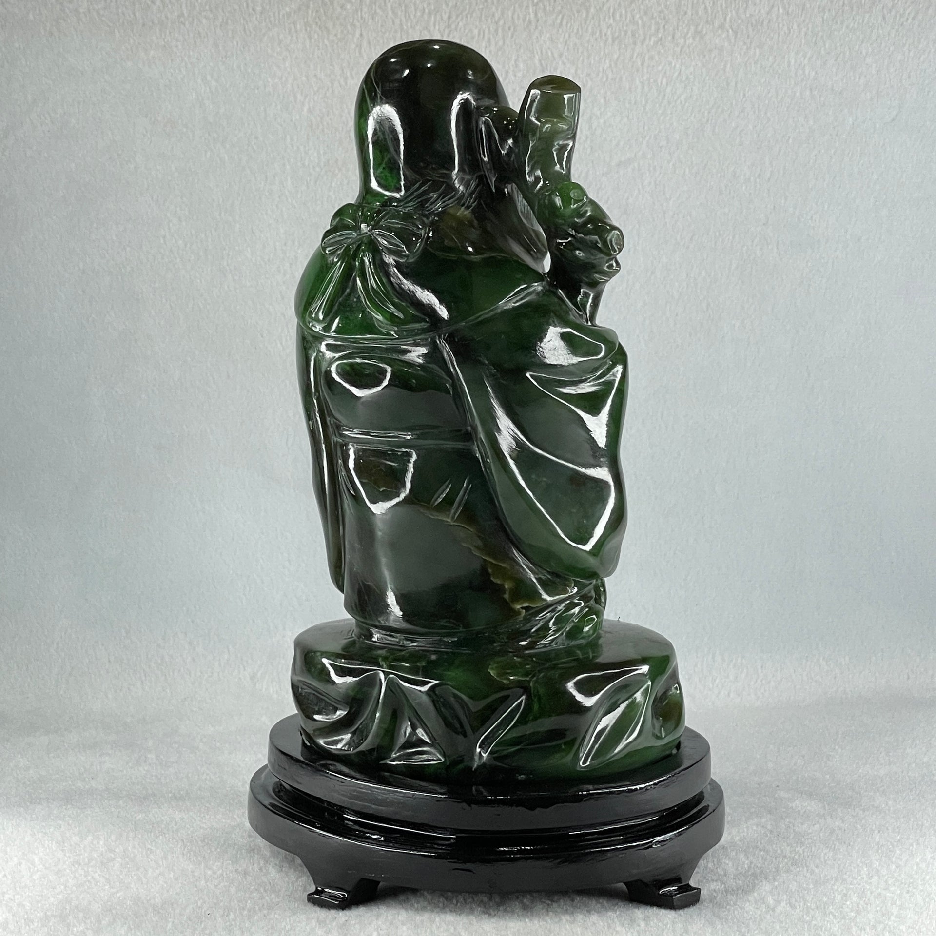 Natural Dark Green Serpentine Shou Xing Gong with Wooden Stand Display 2,374.7g 140.0 by 228.0 by 125.0mm - Huangs Jadeite and Jewelry Pte Ltd