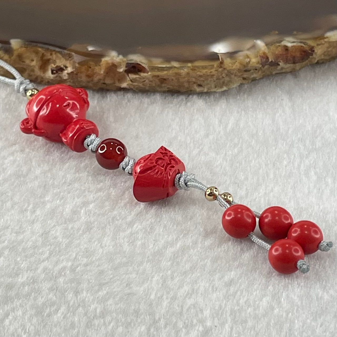 Natural Red Cinnabar Baby God of Fortune 16.0 by 16.8 by 11.3mm with Ingot Yuan Bao 9.0 by 13.06 by 9.1mm and Beads 6.54g - Huangs Jadeite and Jewelry Pte Ltd