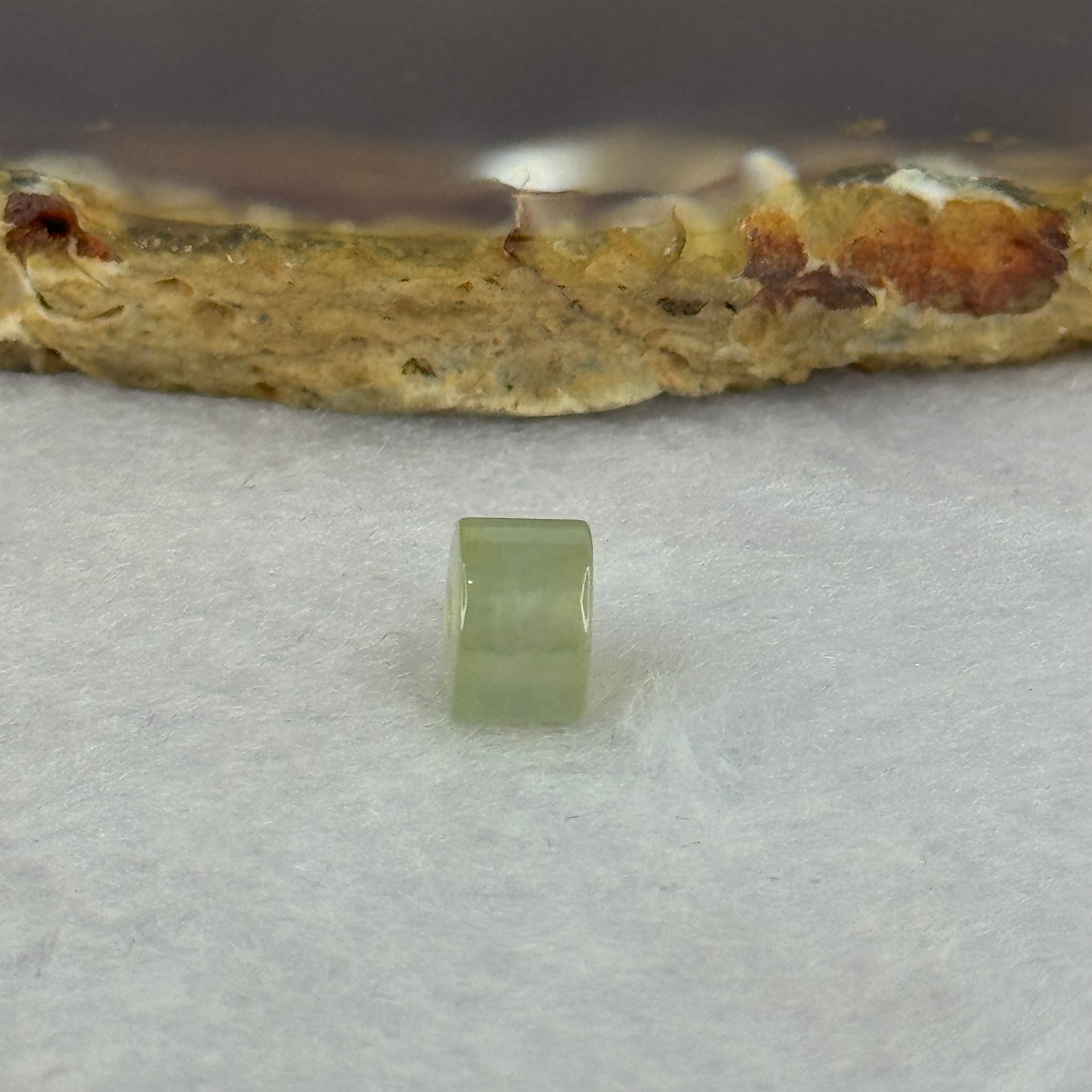 Type A ICY Green Jadeite Bracelet Charm 0.65g 7.4 by 5.1mm - Huangs Jadeite and Jewelry Pte Ltd