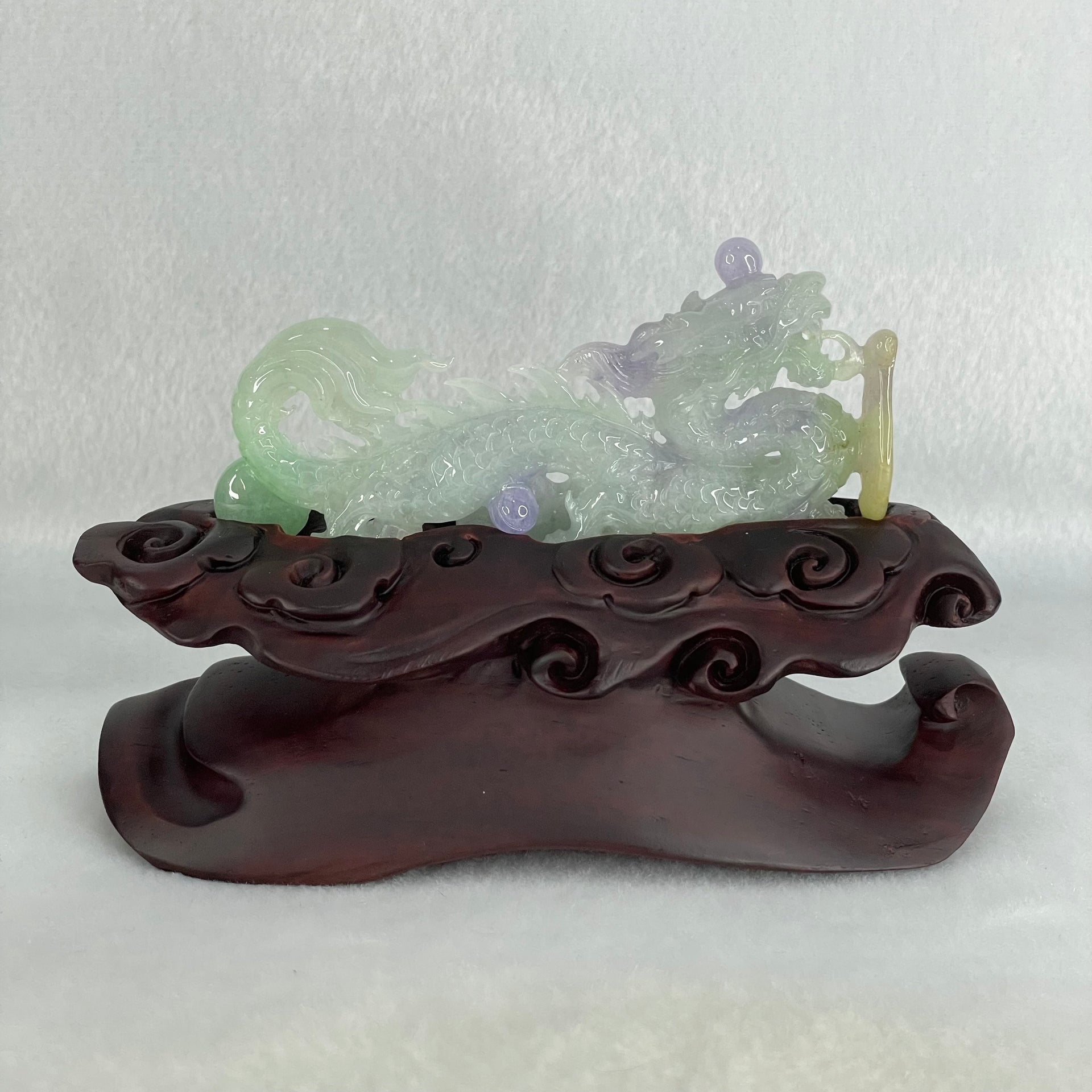 Type A Light Green with Deep Bright Lavender and Yellow Jadeite Pendant 45.66g 8.3 by 3.9 by 11mm with Wooden Stand - Huangs Jadeite and Jewelry Pte Ltd