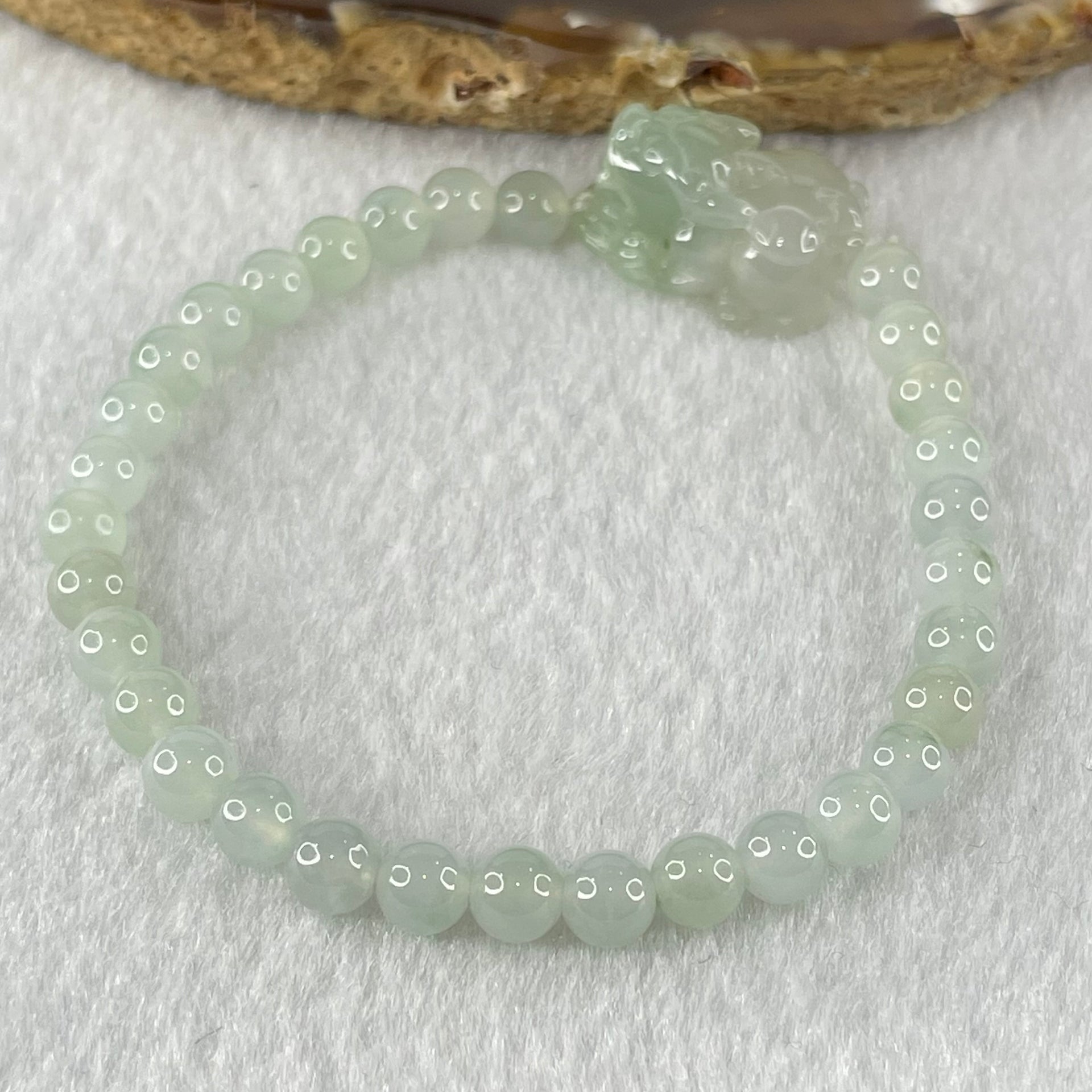 Type A Faint Blueish Green Jadeite Beads with Light Blueish Green Male Pixiu Charm Bracelet 12.93g 15.5cm 5.5cm 31 Beads 21.6 by 14.1 by 10.7mm - Huangs Jadeite and Jewelry Pte Ltd