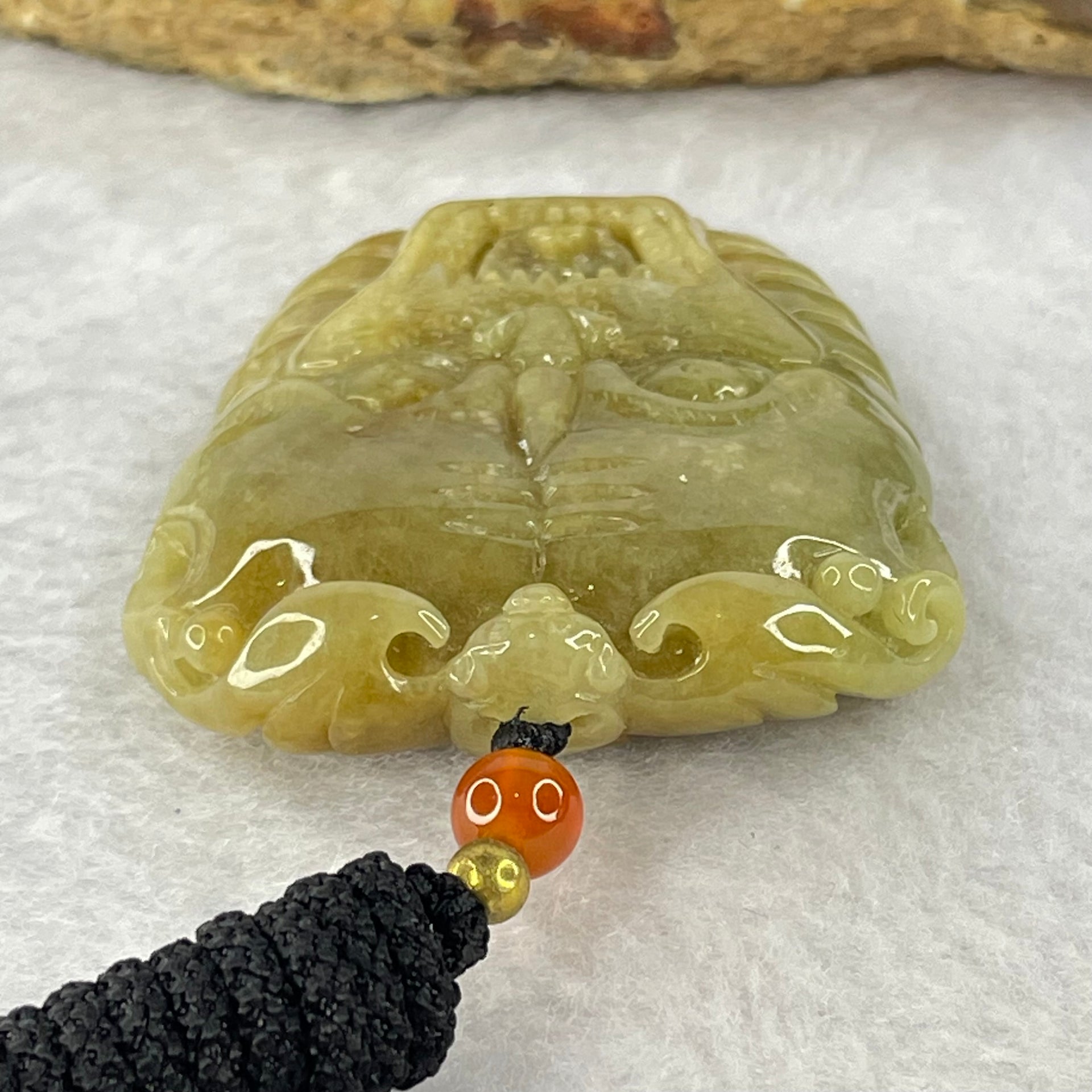 Type A Yellowish Brown Jadeite Tiger Head Pendent 48.59g 49.3 by 42.1 by 12.0mm - Huangs Jadeite and Jewelry Pte Ltd