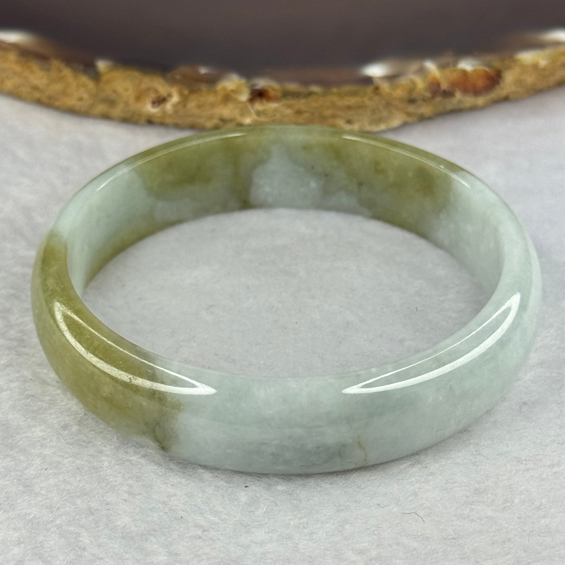 Type A Light Lavender with Brownish Green Patches 57.92g Inner Diameter 57.4mm 13.6 by 13.6 by 5.6mm - Huangs Jadeite and Jewelry Pte Ltd
