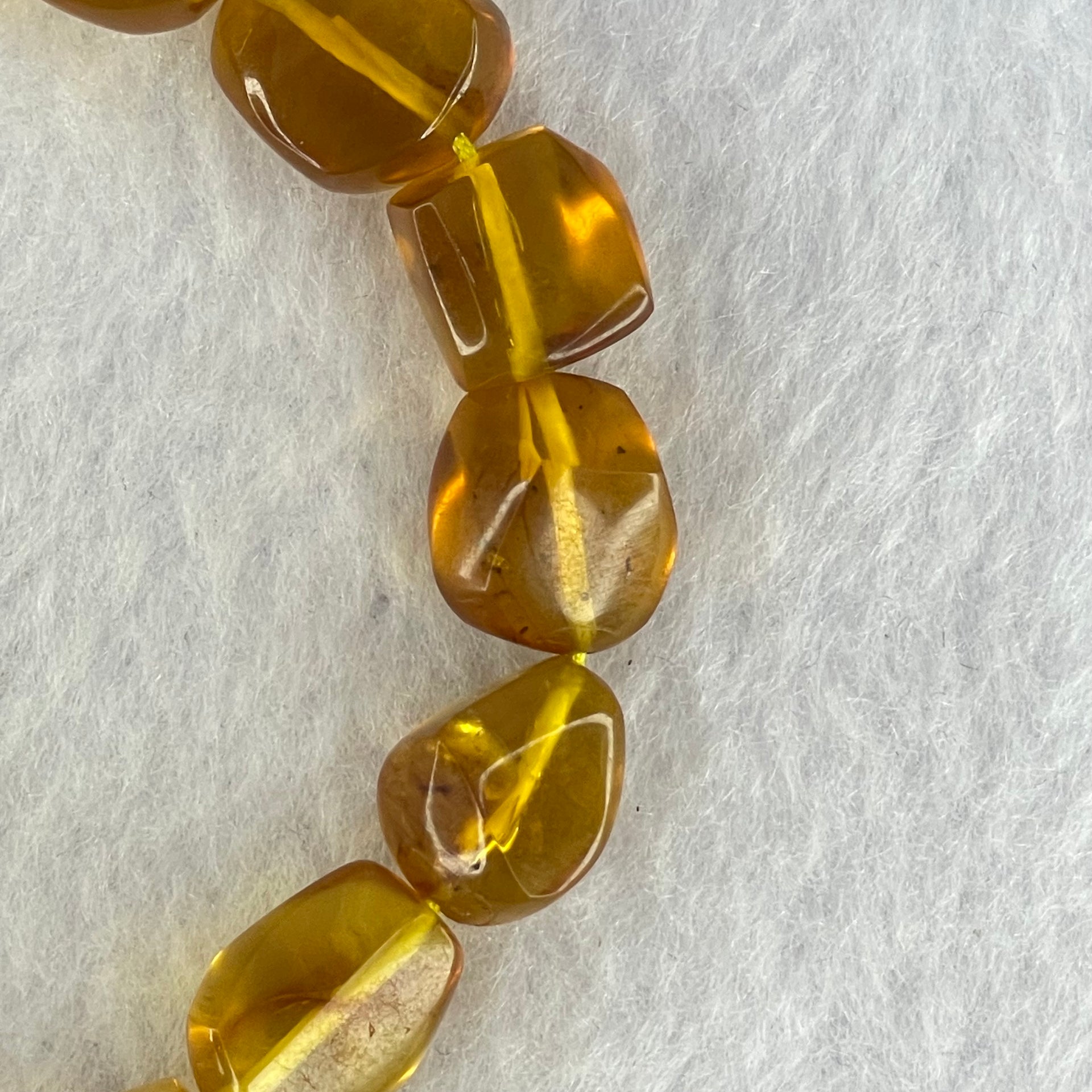 Natural Yellow Amber Fragments Bracelet 11.18g 18cm 15.4 by 10.2 by 8.1mm 15pcs - Huangs Jadeite and Jewelry Pte Ltd