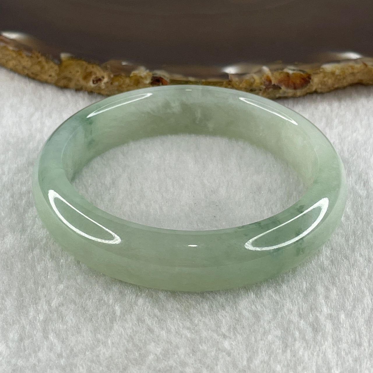 Type A Natural Jelly Semi Icy Light Green with Blueish Green Flora Piao Hua Jadeite Bangle 47.66g Inner Diameter 52.4mm 12.6 by 8.5mm (Internal Lines) - Huangs Jadeite and Jewelry Pte Ltd