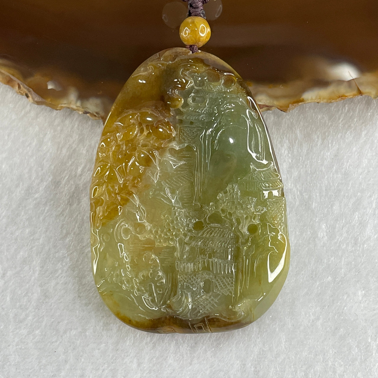Grand Master Type A Green with Brownish Jadeite Shan Shui with Gui Ren Double Side Pendant 52.28g 55.3 by 38.2 by 7.3mm