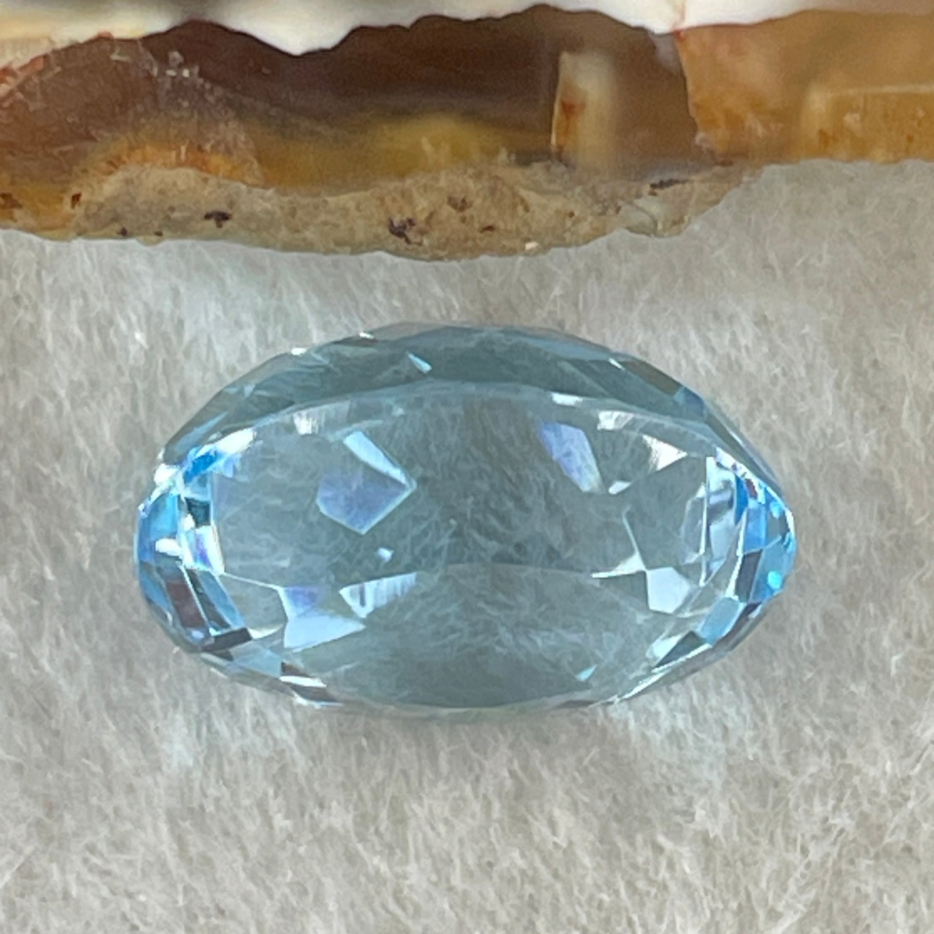 Natural Sky Blue Topaz Oval Shape 11.63ct 14.5 by 11.3 by 8.4mm - Huangs Jadeite and Jewelry Pte Ltd