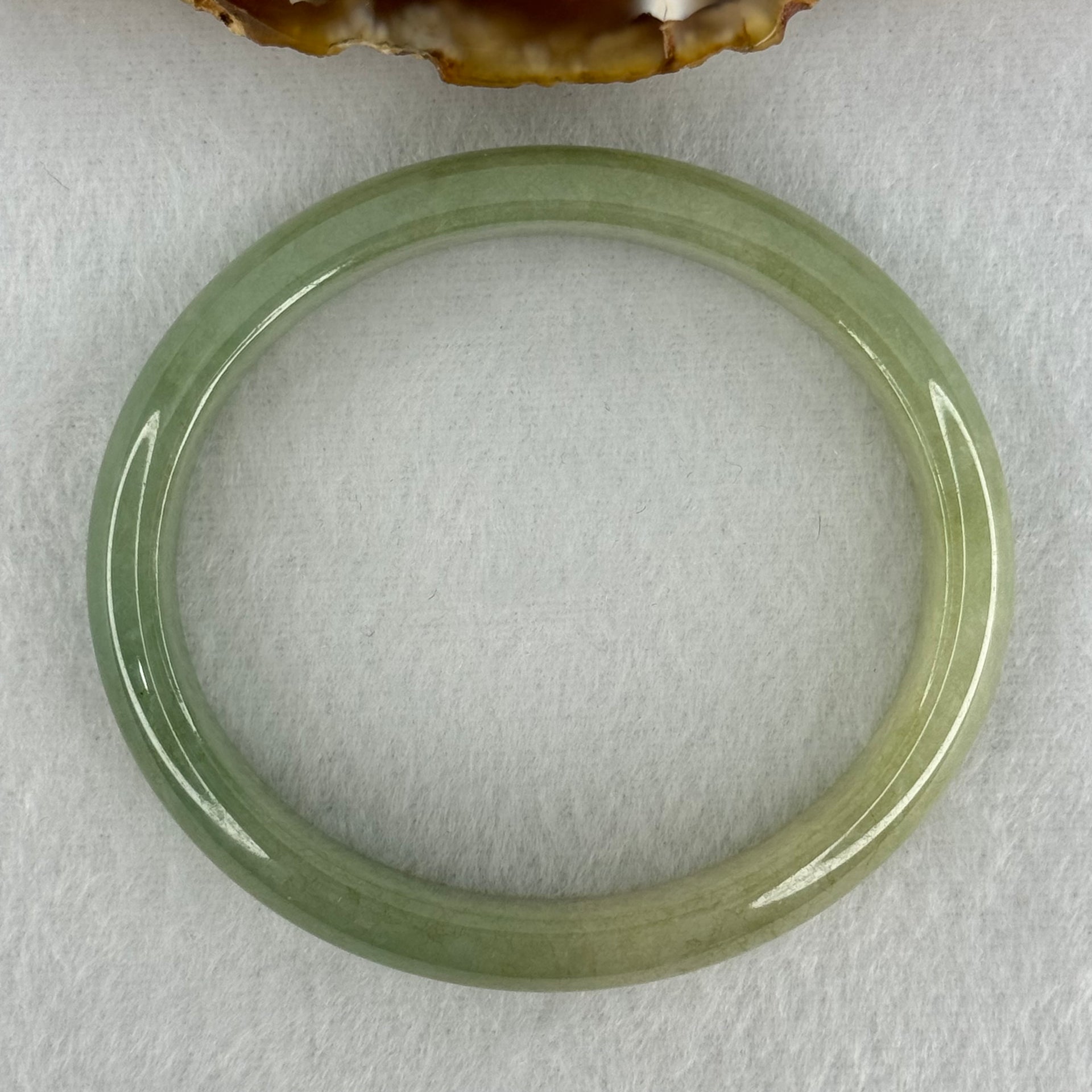 Type A Full Green Jadeite Oval Bangle Internal Diameter 55.4mm 11.9 by 6.5mm (Very Slight Fine Internal Lines) - Huangs Jadeite and Jewelry Pte Ltd