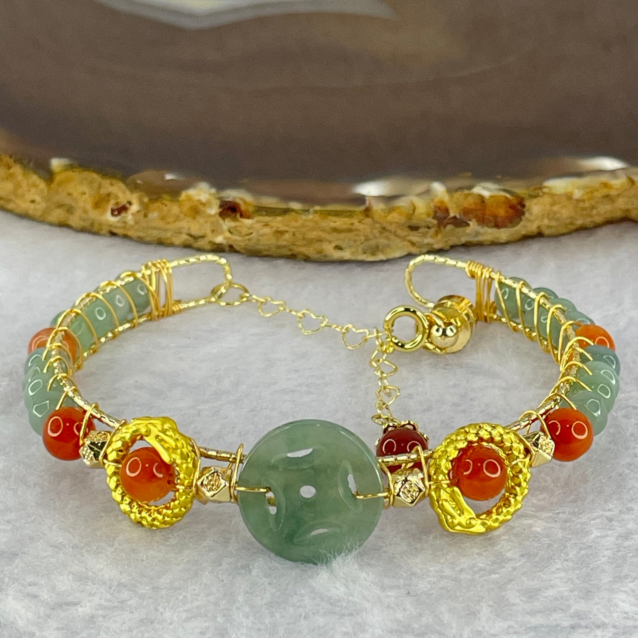 Type A Icy Blueish Green Jadeite Coin 15.6 by 2.5mm and Jadeite Beads in Gold Color Bracelet 14.08g 16cm 5.5 by 4.0mm 16 Beads - Huangs Jadeite and Jewelry Pte Ltd