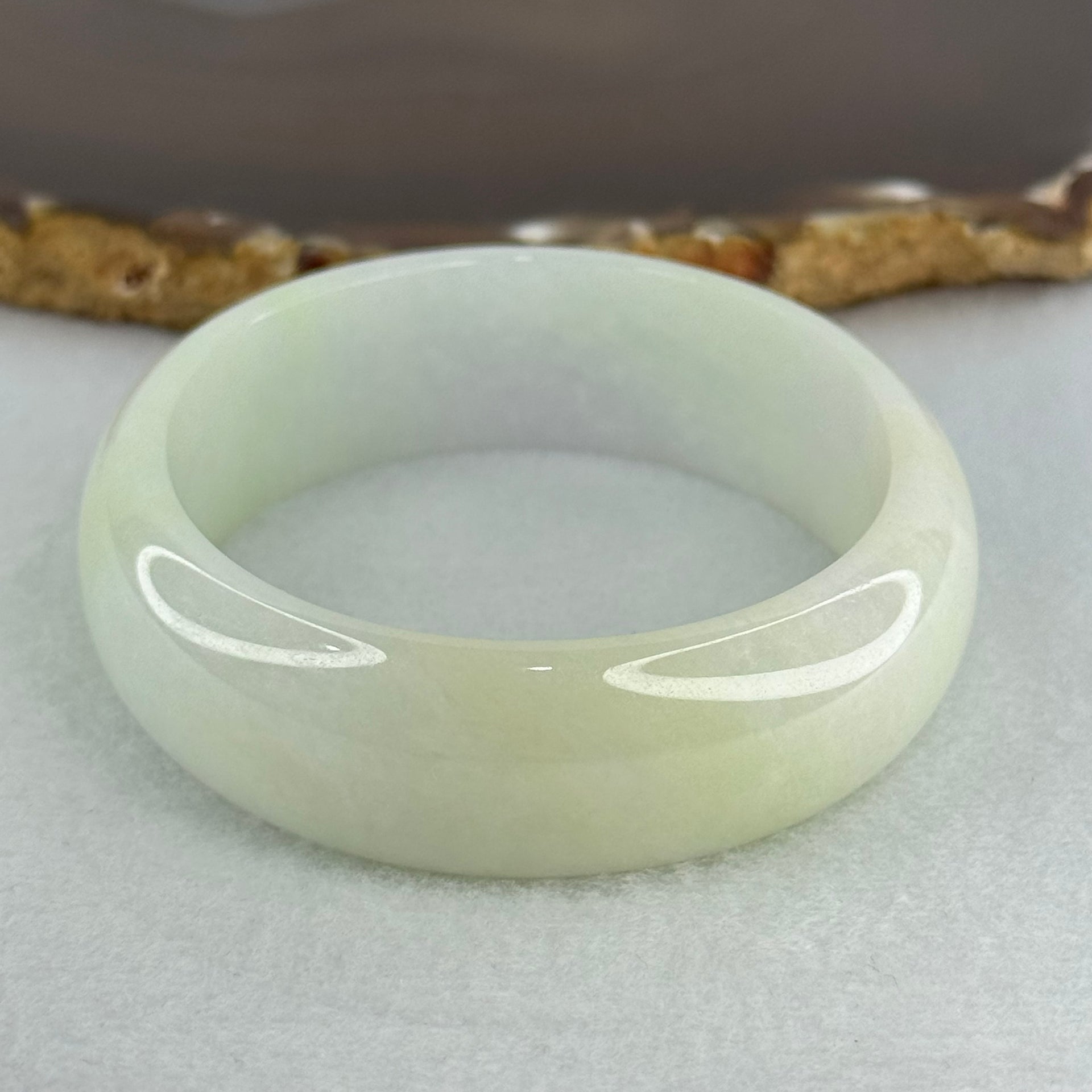 Type A Faint Lavender Green Jadeite Oval Bangle Internal Diameter 57.1mm 57.86g 17.3 by 6.9mm (Close to Perfect) - Huangs Jadeite and Jewelry Pte Ltd