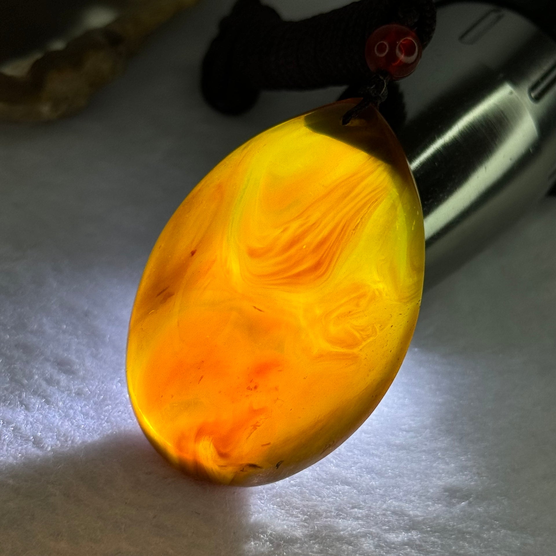 Natural Cognac with Red Amber Teardrop Shape Pendent 14.81g 44.9 by 30.5 by 19.0mm - Huangs Jadeite and Jewelry Pte Ltd