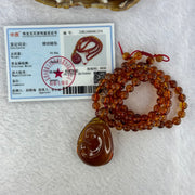 Natural Cognac Amber Ruyi Pendent 37.7 by 27.0 by 12.2mm in Amber Beads Necklace 6.3mm 105 Beads Total 19.80g - Huangs Jadeite and Jewelry Pte Ltd