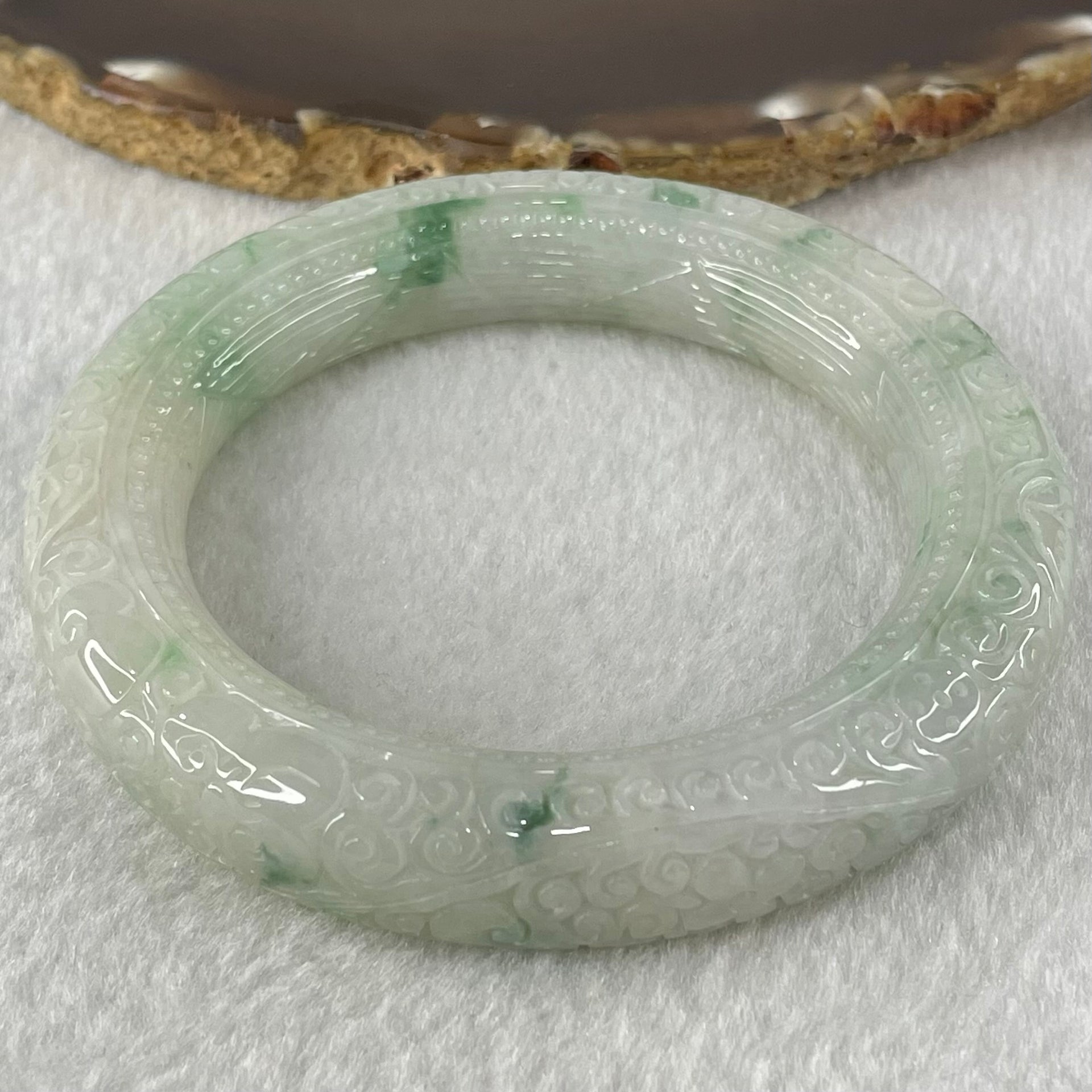 Type A Light Green with Blueish Green Piao Hua Jadeite Carved Floral FU and Ruyi Blessing Bangle 87.62g Internal Diameter 55.7mm 13.0 by 12.7mm (Internal Line) - Huangs Jadeite and Jewelry Pte Ltd