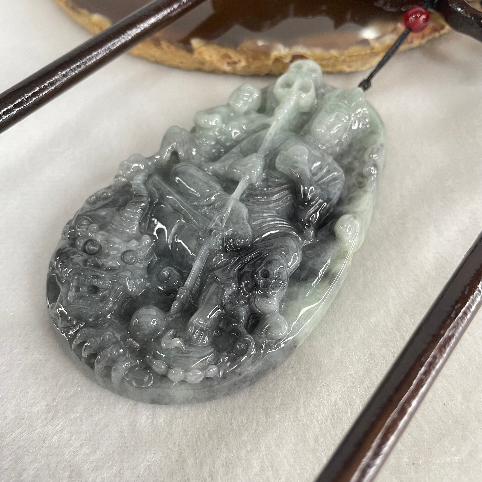 Type A Green With Wuji Grey Piao Hua Jadeite Ksitigarbha Bodhisattva, 地藏王菩萨, the Bodhisattva of Great Aspiration Display 178.8g 111.7 by 51.8 by 200.0mm - Huangs Jadeite and Jewelry Pte Ltd