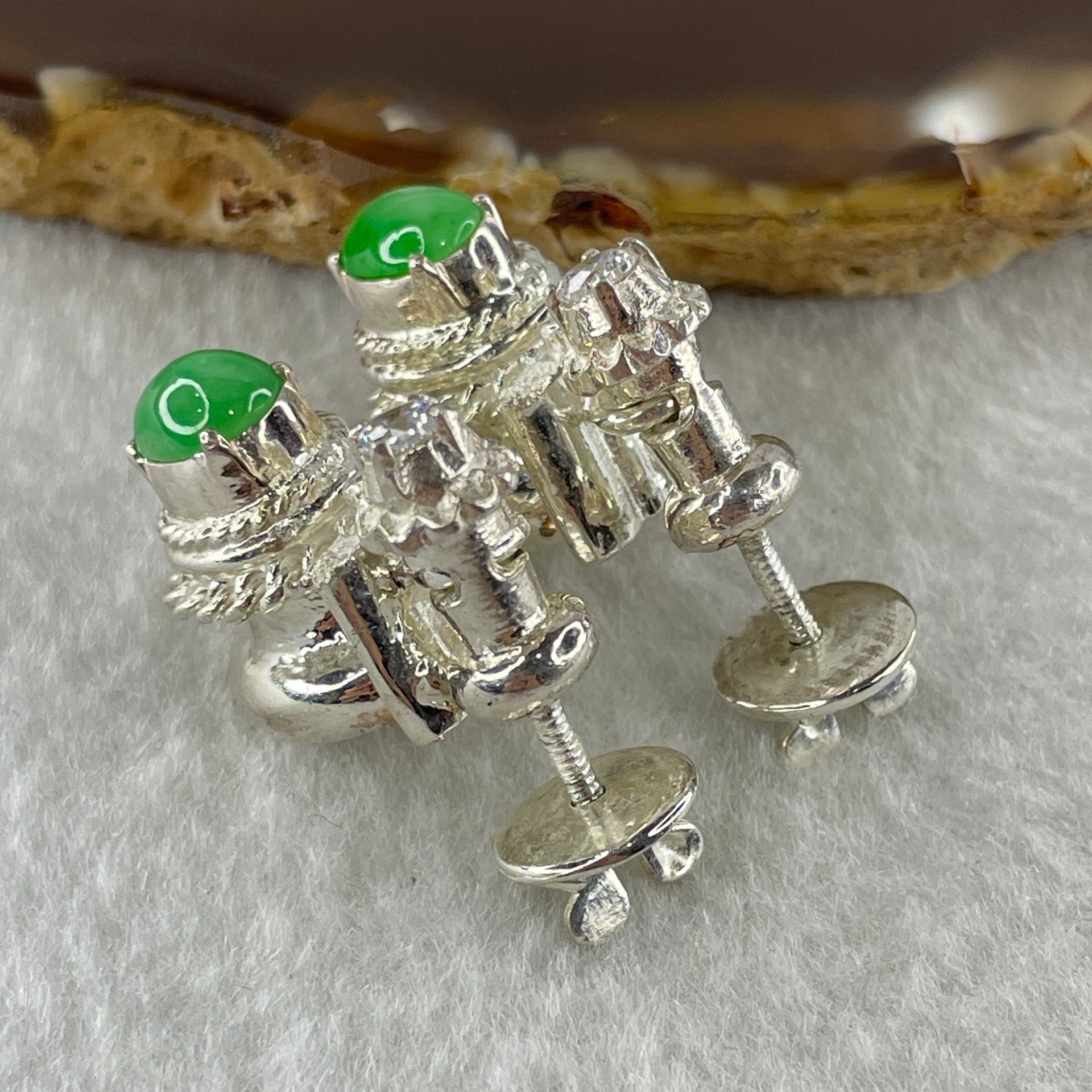 Type A Natural Apple Green Jadeite Cabochon 8.1 by 6.2 by 3.0mm Stone for Setting 20.60g (On Silver Earring Mold) - Huangs Jadeite and Jewelry Pte Ltd