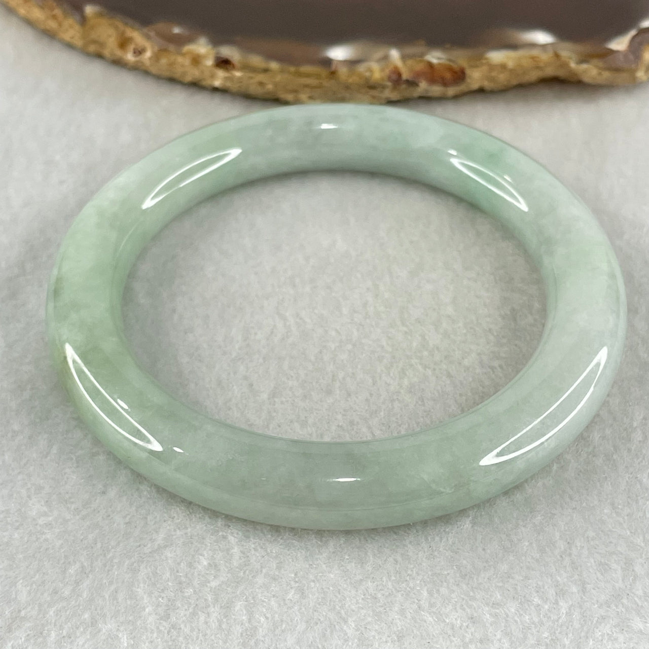 Type A Light Green Jadeite Bangle 61.11g Inner Diameter 58.5mm 10.1 by 10.7mm (Slight Internal Lines) - Huangs Jadeite and Jewelry Pte Ltd