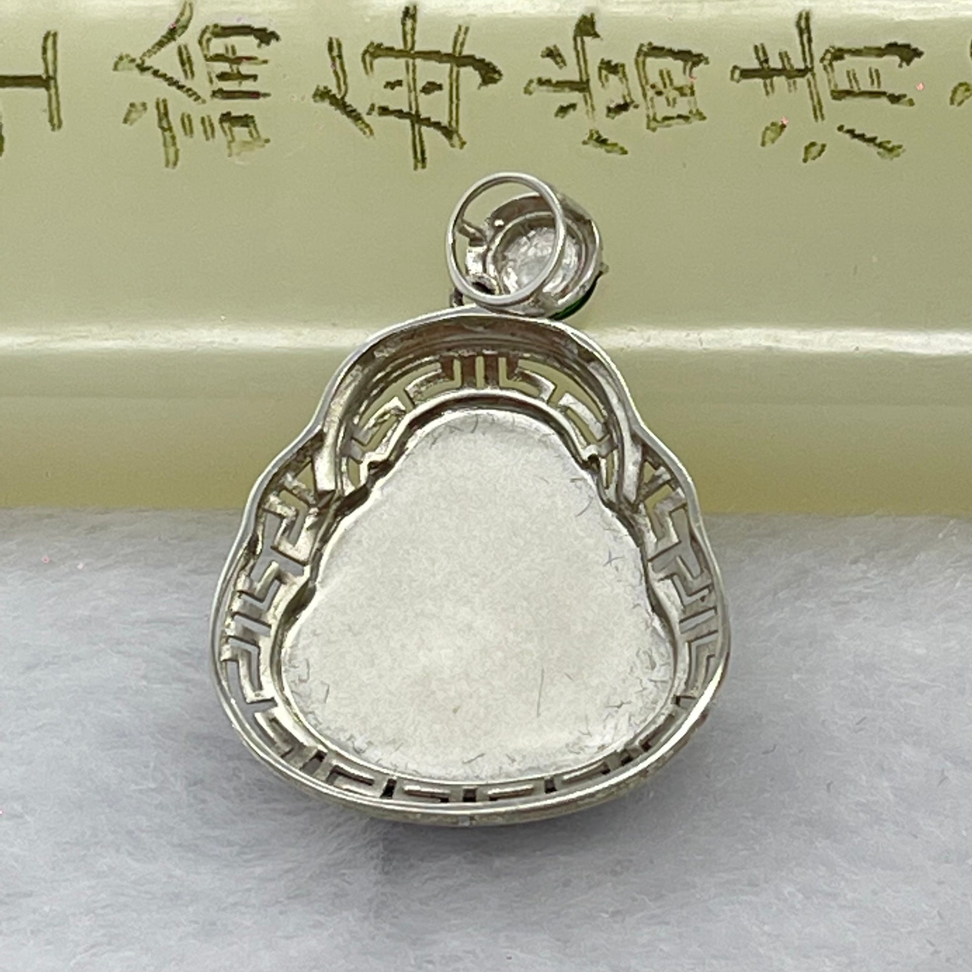 Type A Blueish Green Jadeite Milo Buddha Pendant Setting 18k White Gold 2.45g 25.6 by 19.4 by 7.2mm - Huangs Jadeite and Jewelry Pte Ltd