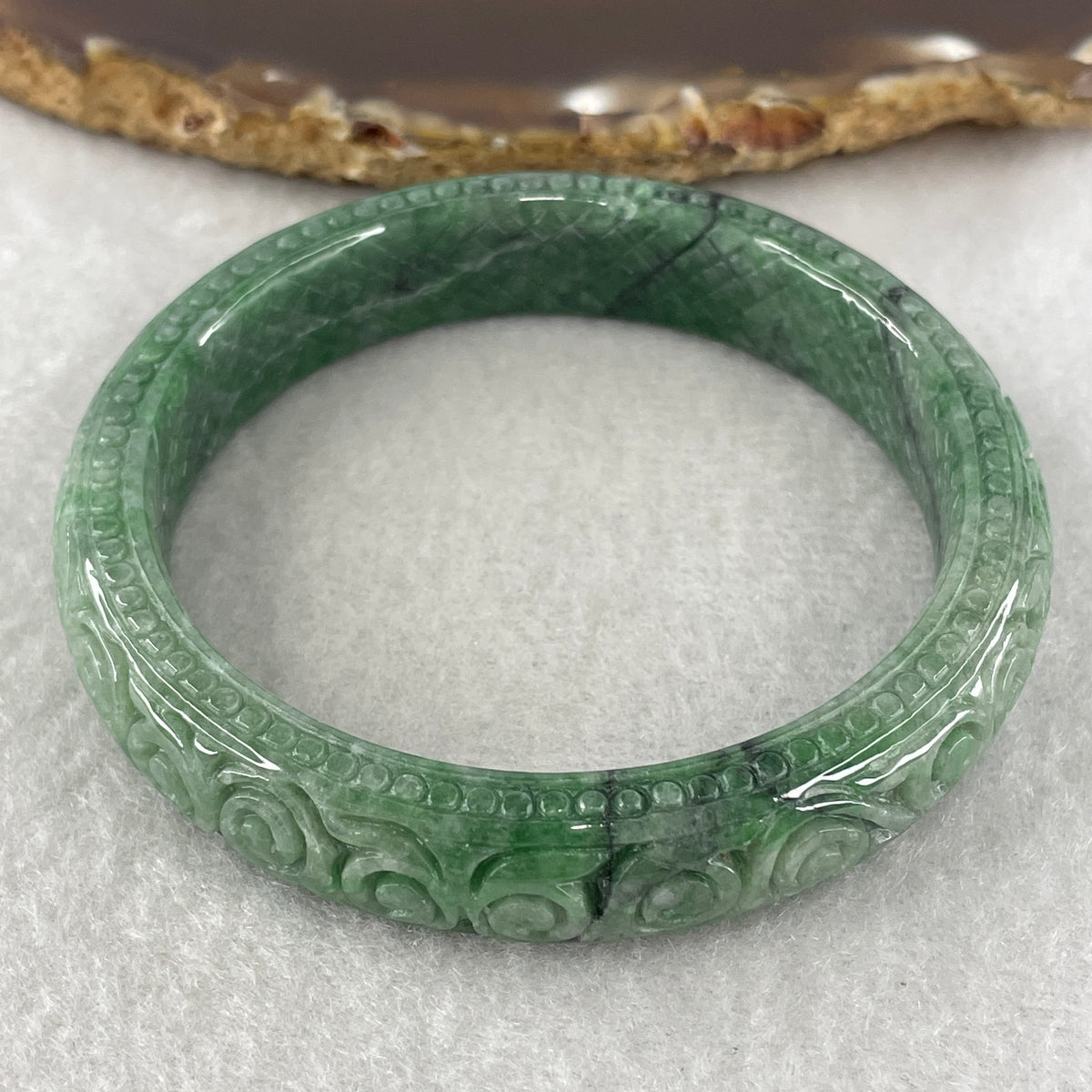 Natural Type Green Jadeite Prosperity Flowers Bangle 46.28g Inner Diameter 55.6mm 12.1 by 8.2mm (External Line) - Huangs Jadeite and Jewelry Pte Ltd