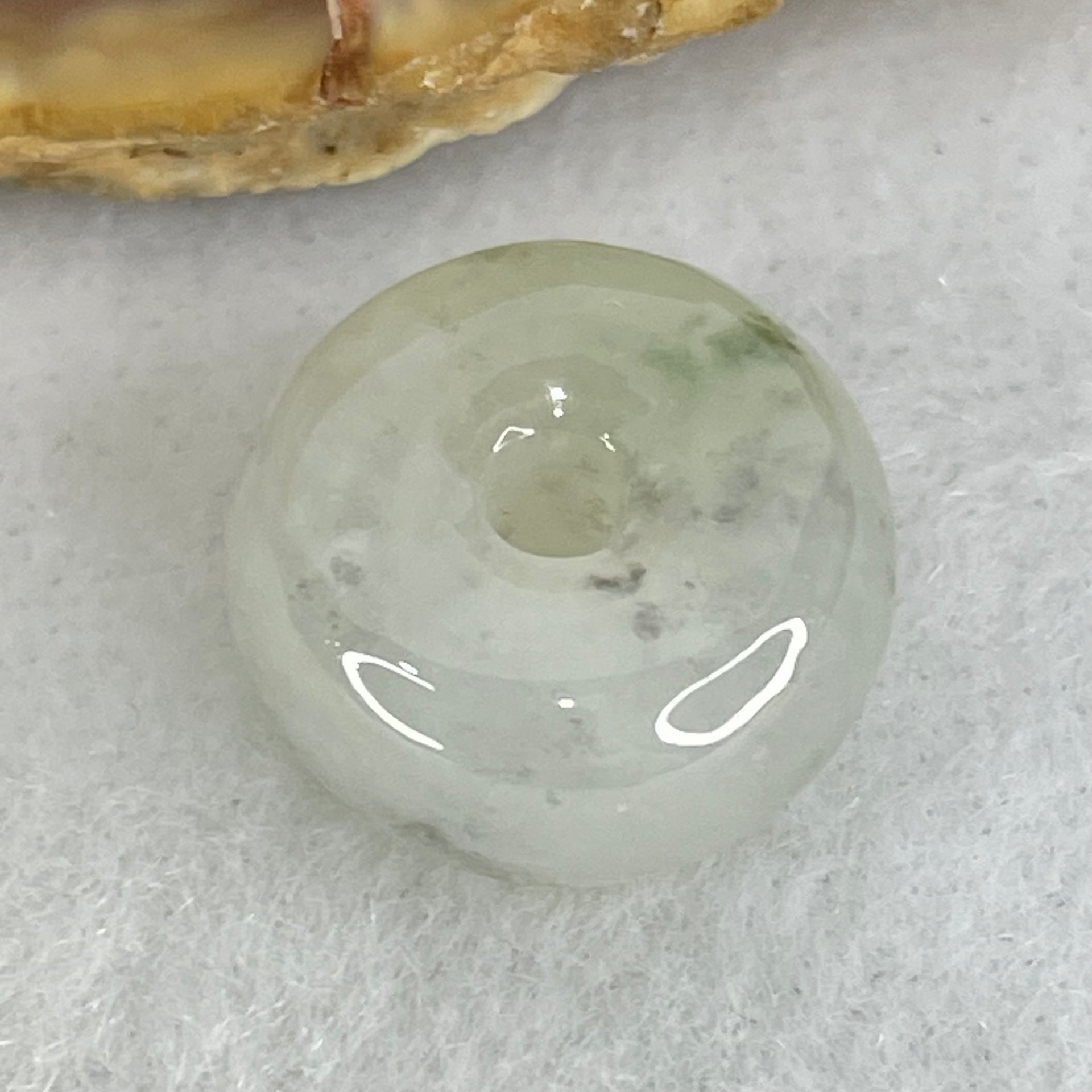 Type A Semi Icy Faint Green Jadeite Ping An Kou Donut Pendant 2.44g 13.2 by 6.6mm - Huangs Jadeite and Jewelry Pte Ltd