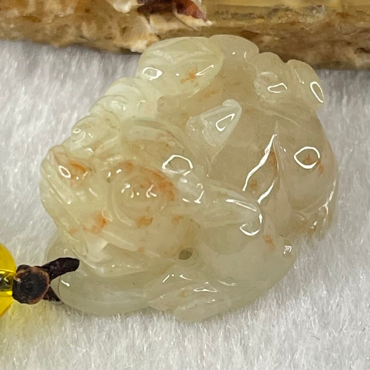 Type A Faint Yellow with Reddish Brown Spots Jadeite Male Pixiu Charm 8.27g 22.5 by 16 by 12.2mm - Huangs Jadeite and Jewelry Pte Ltd