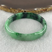 Type A Natural Old Mine Spicy Green with Dark Green Piao Hua Flora Jadeite Oval Bangle 26.28g 131.60cts Inner Diameter 52.55mm 46.90 by 5.40mm with NGI Cert 63804952 (Very Very Slight Internal Lines) - Huangs Jadeite and Jewelry Pte Ltd