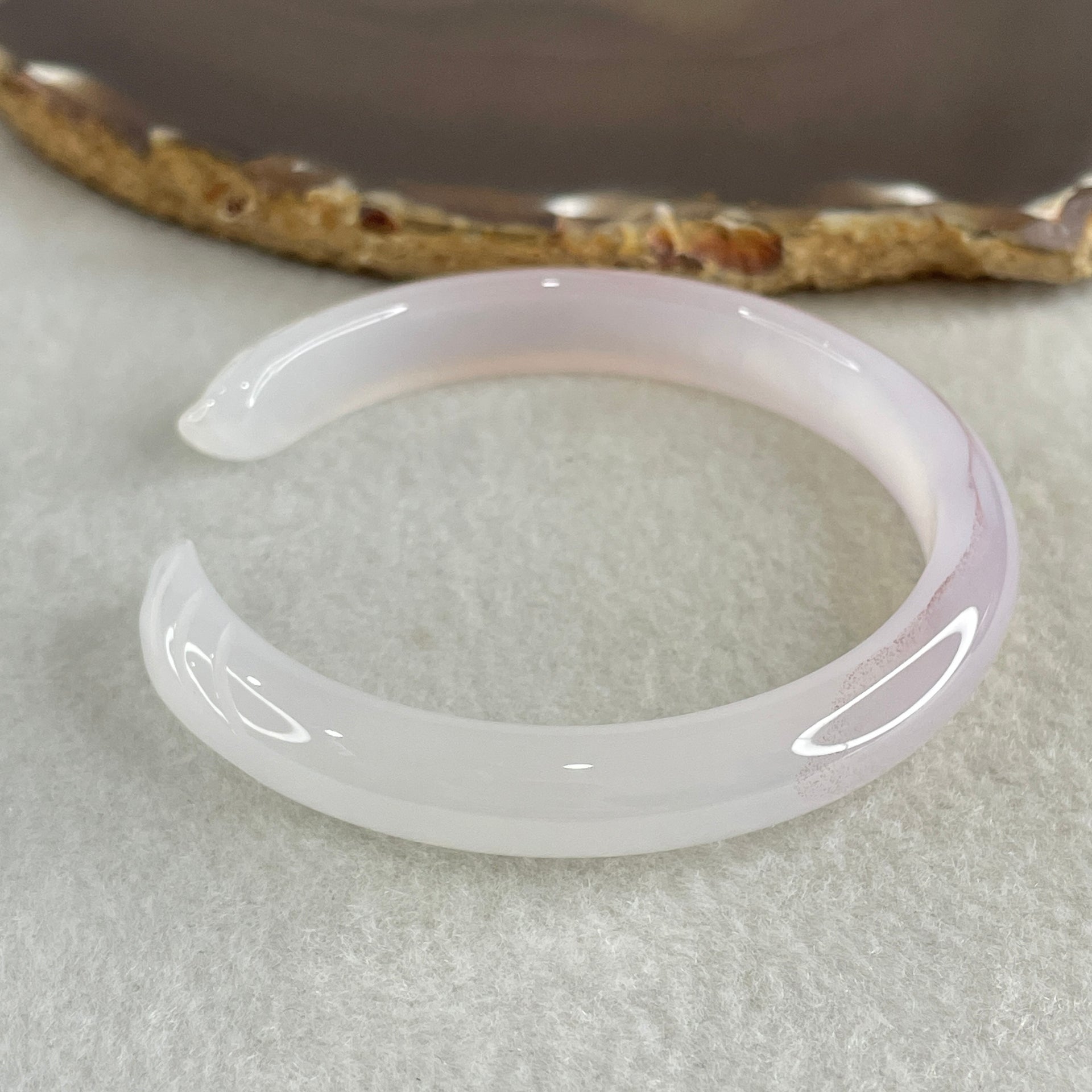Natural Pinky Agate Fox Bange Internal Dimeter 59.0mm 25.35g 9.8 by 7.2mm - Huangs Jadeite and Jewelry Pte Ltd
