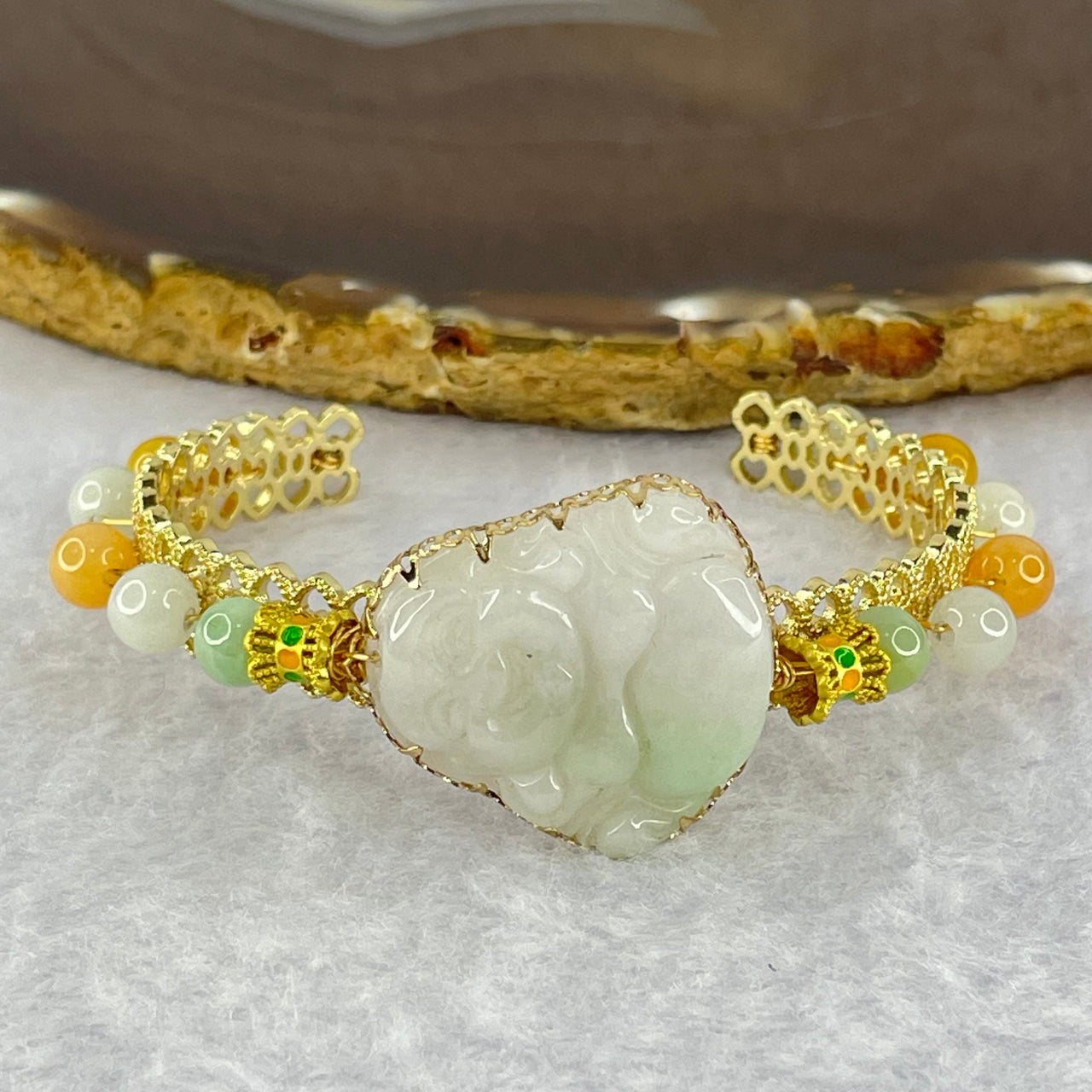 Type A Faint Green Jadeite Milo Buddha 25.5 by 25.4 by 6.7mm and Beads in Gold Color Bracelet 19.51g 6.1mm 12 Beads - Huangs Jadeite and Jewelry Pte Ltd