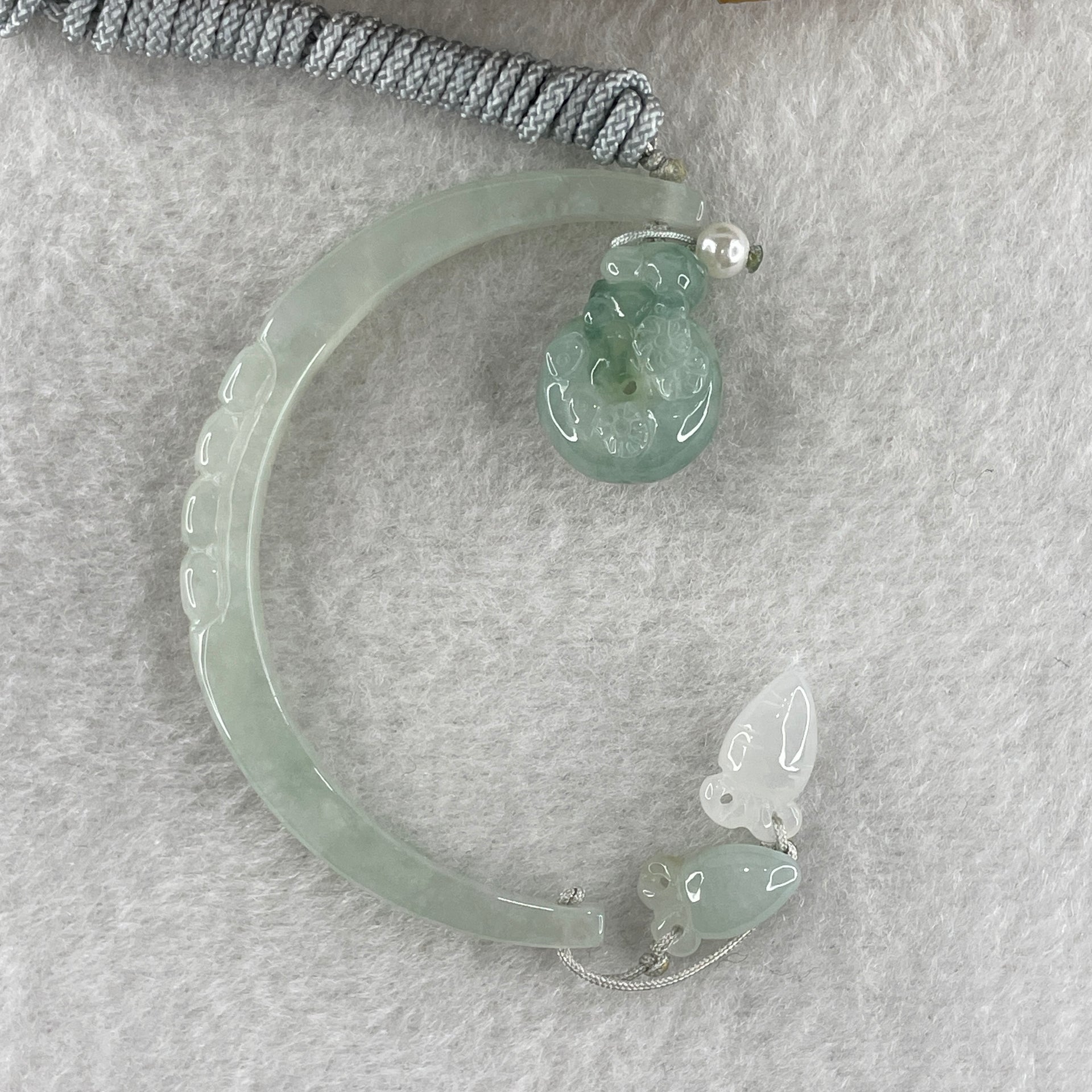 Natural Type A Semi Icy Light Green Jadeite Moon with Rabbit and Flower on Ping An Kou and Carrot Necklace 11.72g 17.2 by 13.6 by 8.6mm Ping An Kou - 56.7 by 4.4 by 5.5mm Moon - Huangs Jadeite and Jewelry Pte Ltd