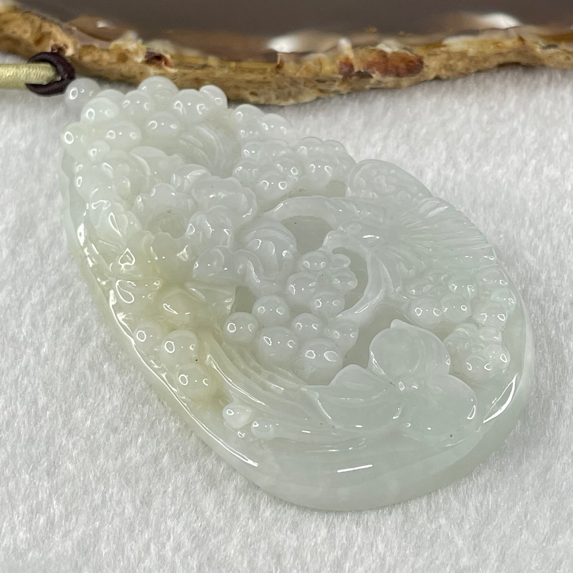 Type A Faint Green Lavender with Faint Yellow Patch Jadeite Bird with Flowers Pendant 79.61g 78.7 by 47.1 by 12.2mm - Huangs Jadeite and Jewelry Pte Ltd