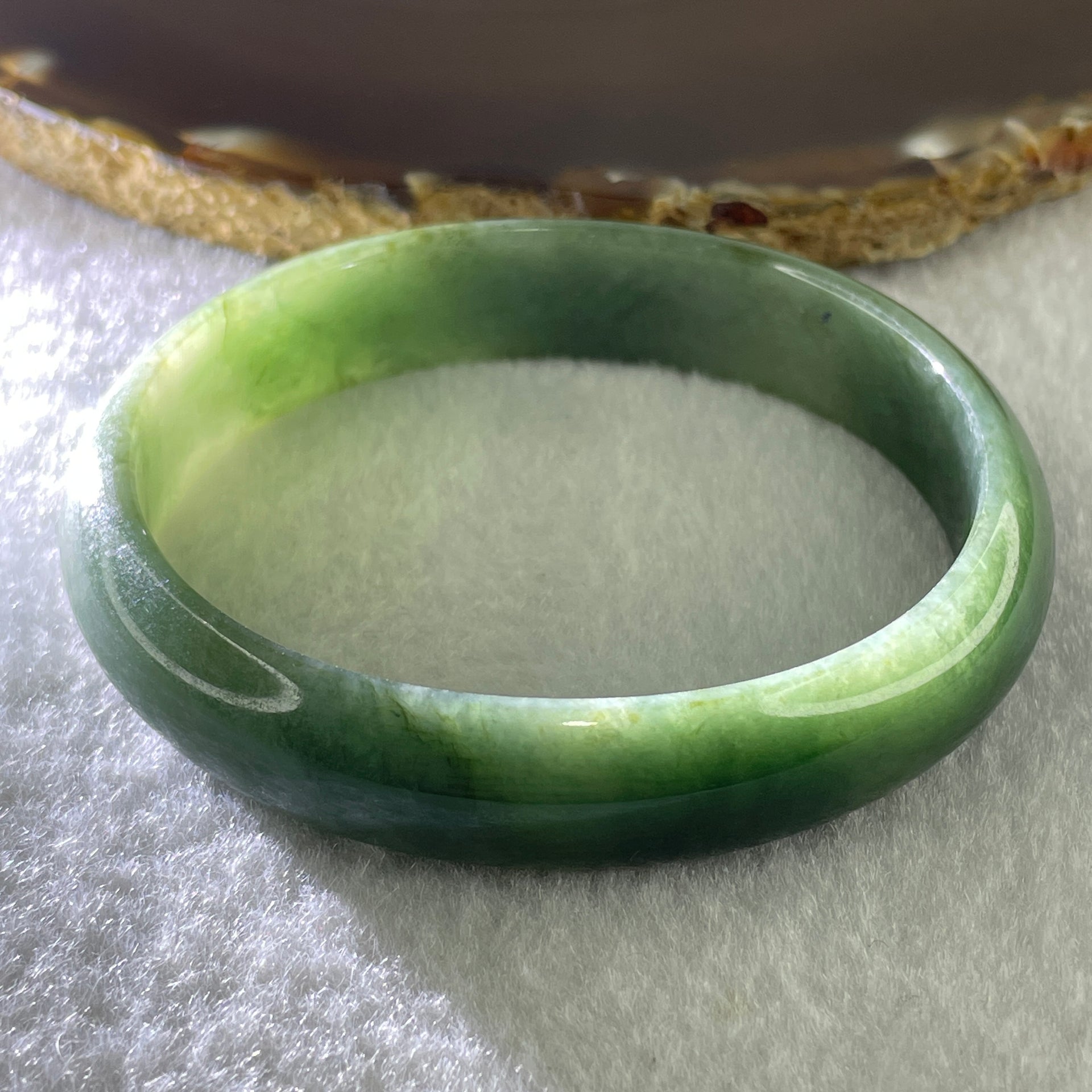 Type A Natural Oily Green Jadeite Oval Bangle 38.02g Inner Diameter 57.8mm 13.0 by 6.1mm (Very Slight Internal Lines) - Huangs Jadeite and Jewelry Pte Ltd