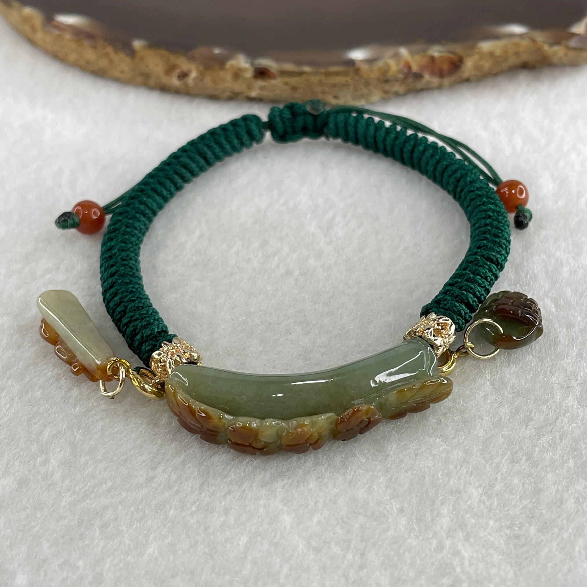 Natural Type A Brownish with Green Jadeite Flowers with Gold Fish and Bag Charms Bracelet 12.29g 17cm 7.0 by 10.9mm - Huangs Jadeite and Jewelry Pte Ltd