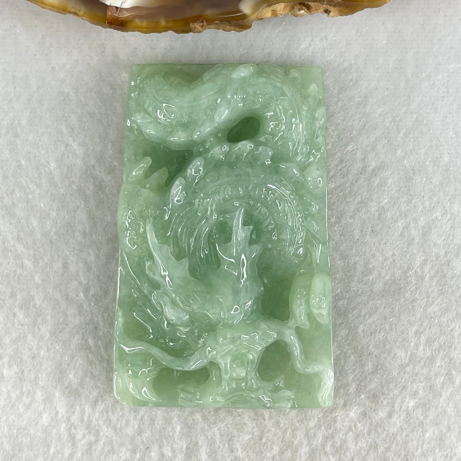 Type A Light Green Jadeite Dragon Pendant 43.35g 50.7 by 32.4 by 13.8mm - Huangs Jadeite and Jewelry Pte Ltd