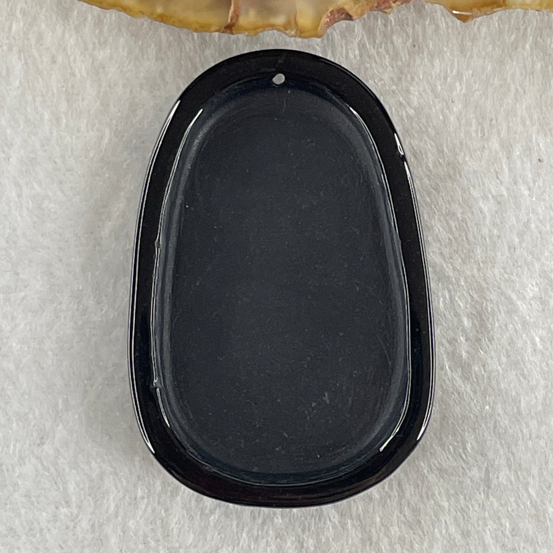 Type A Opaque to Partial Translucent Black Omphacite Jadeite Baby Buddha Pendant 13.75g 42.0 by 28.2 by 8.6mm - Huangs Jadeite and Jewelry Pte Ltd